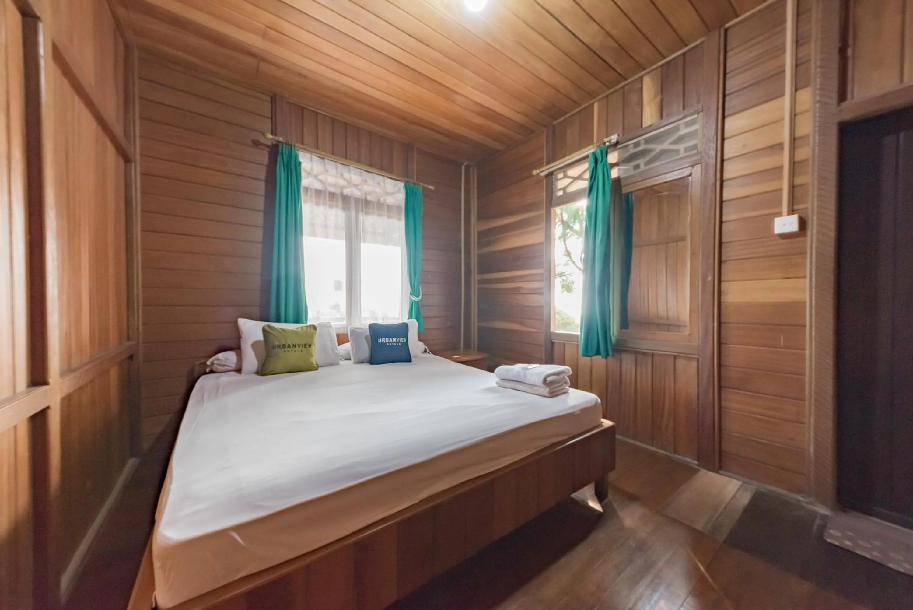 Bed in Urbanview Resort Anty Cisarua Tugu Puncak by RedDoorz