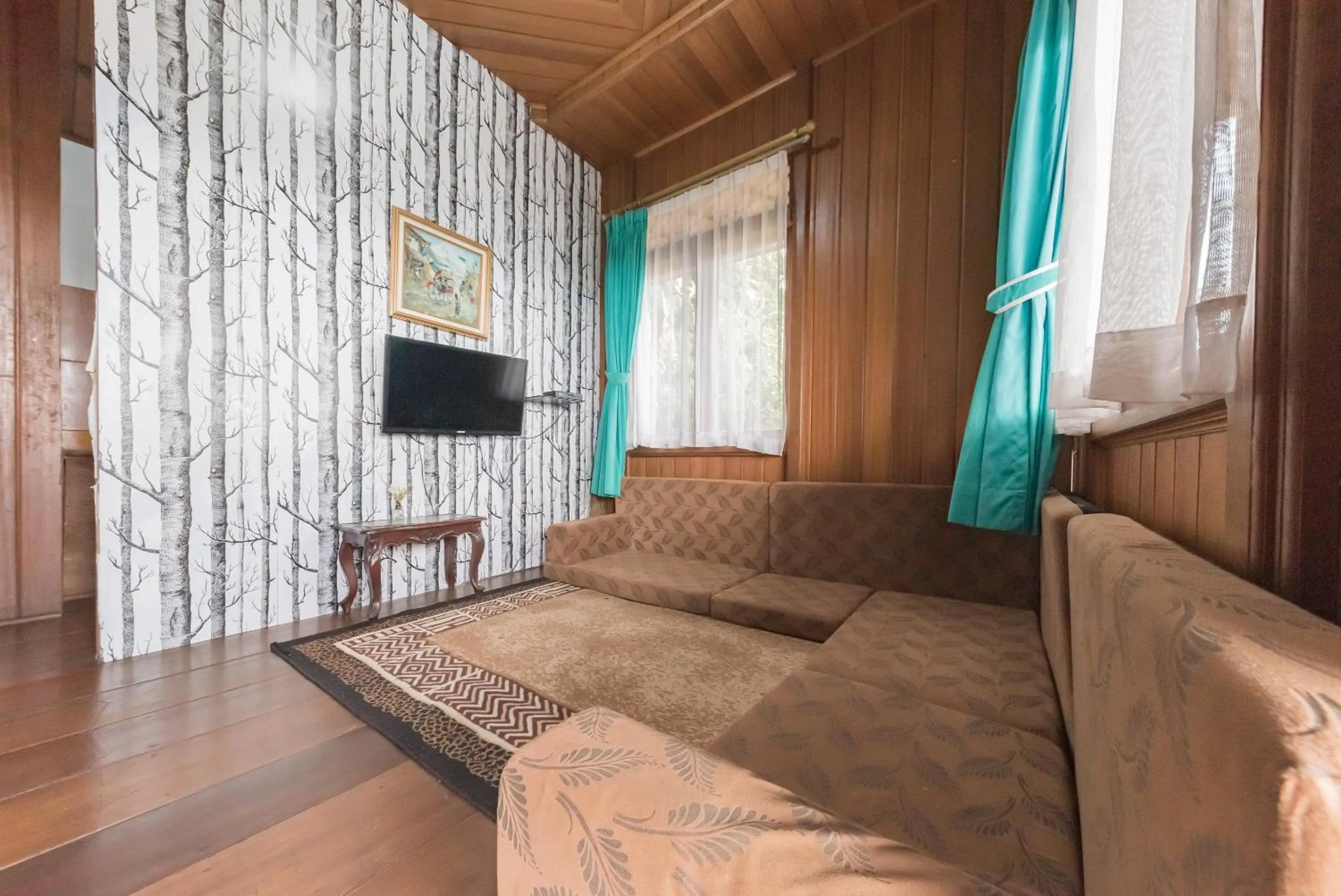 Living room in Urbanview Resort Anty Cisarua Tugu Puncak by RedDoorz