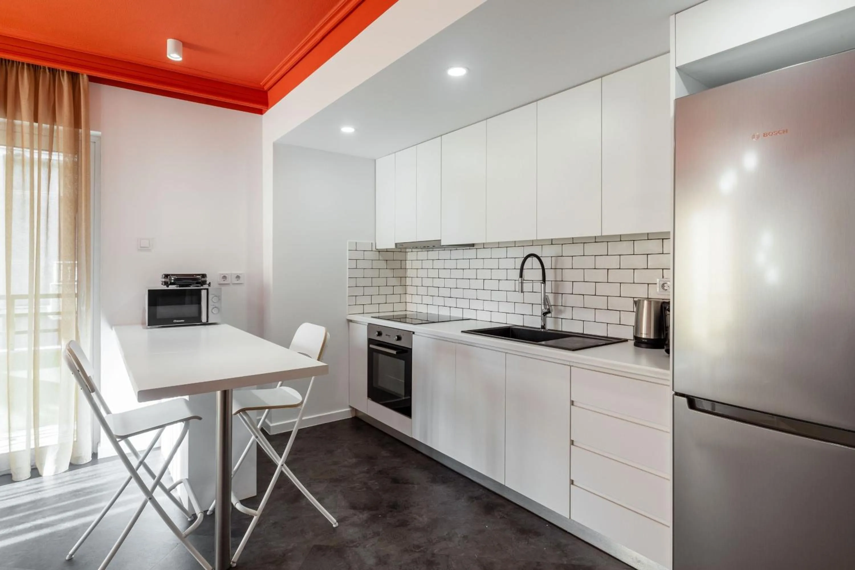 Dining area in OneZeroTwo by Zoia Living