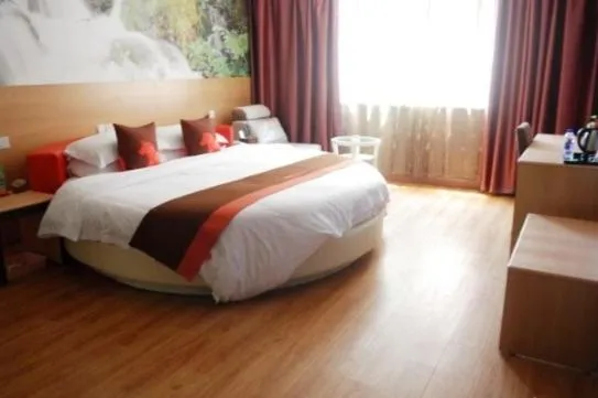 Bed in Junyi Hotel Jinhua Wuyi Hot Spring Bus Terminal Station