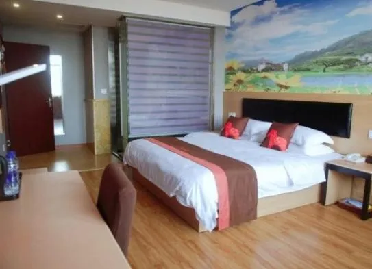 Bed in Junyi Hotel Jinhua Wuyi Hot Spring Bus Terminal Station