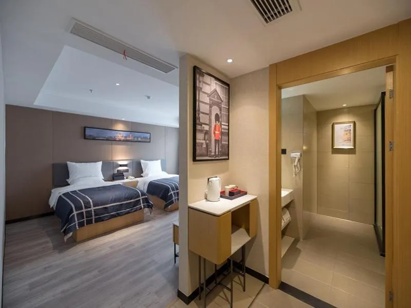 Bed in LanOu Hotel Wuxi Anzhen East High-Speed Railway Station