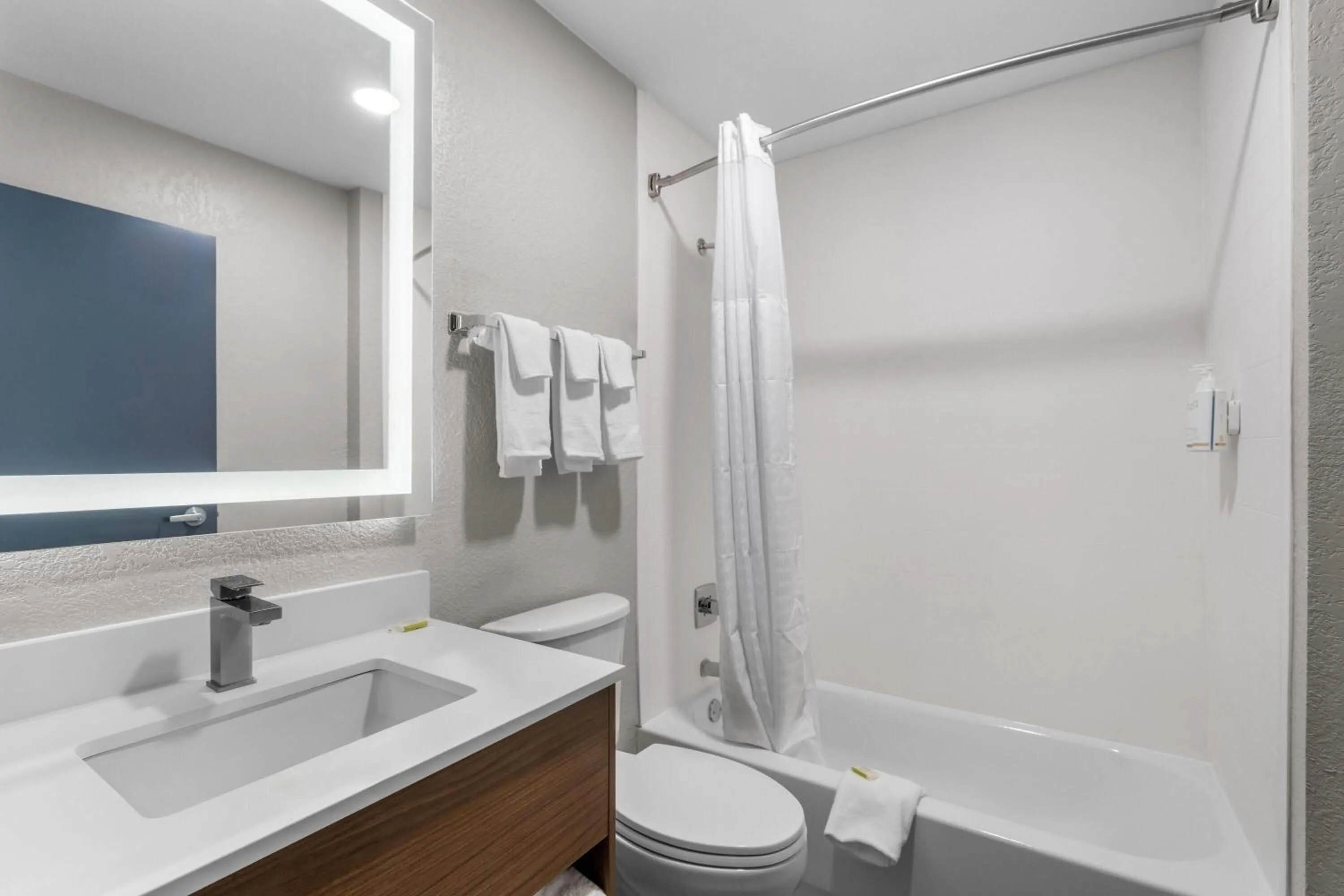 Bathroom in Days Inn & Suites by Wyndham Brandon Amphitheater