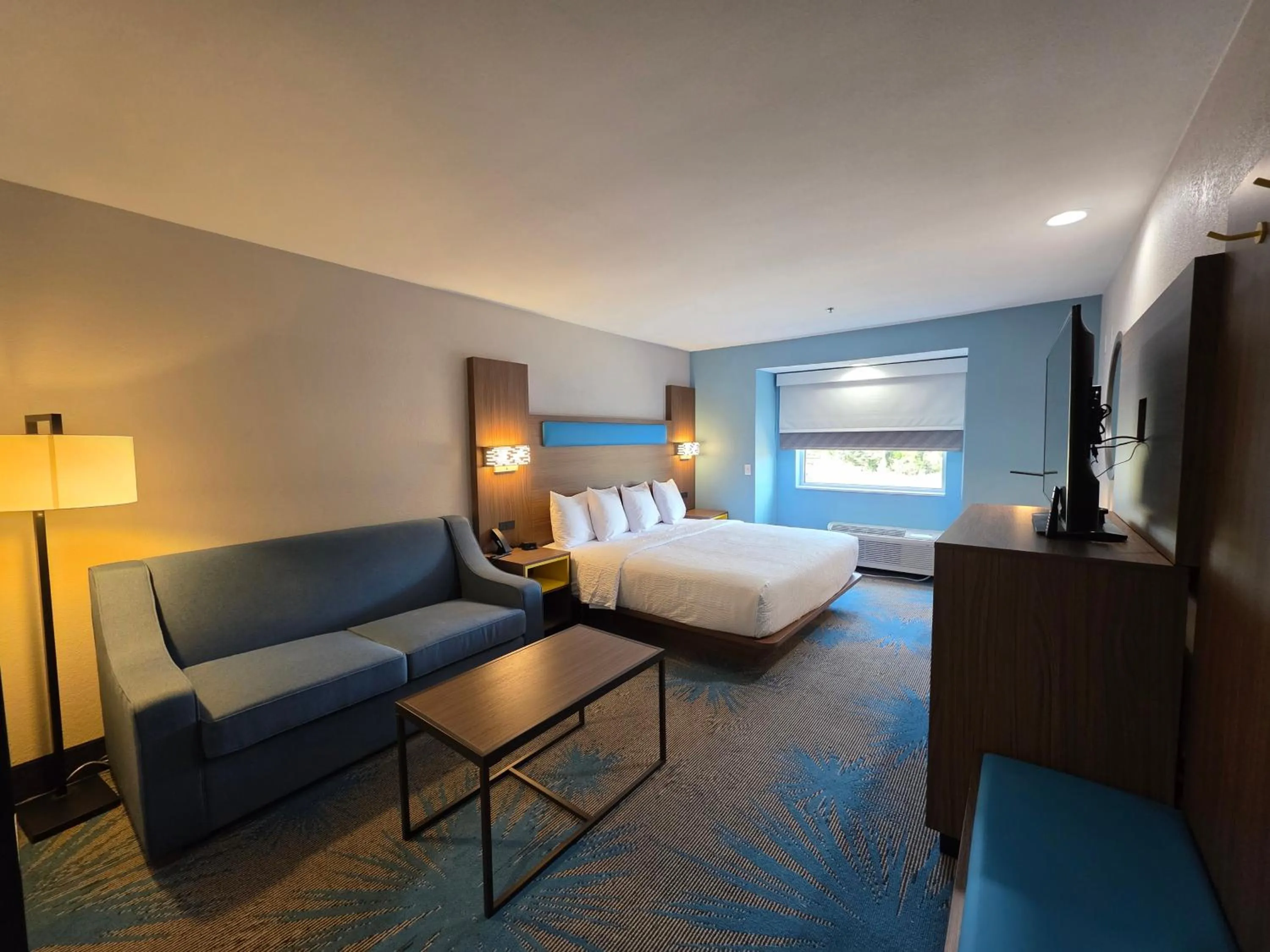 Bed in Days Inn & Suites by Wyndham Brandon Amphitheater