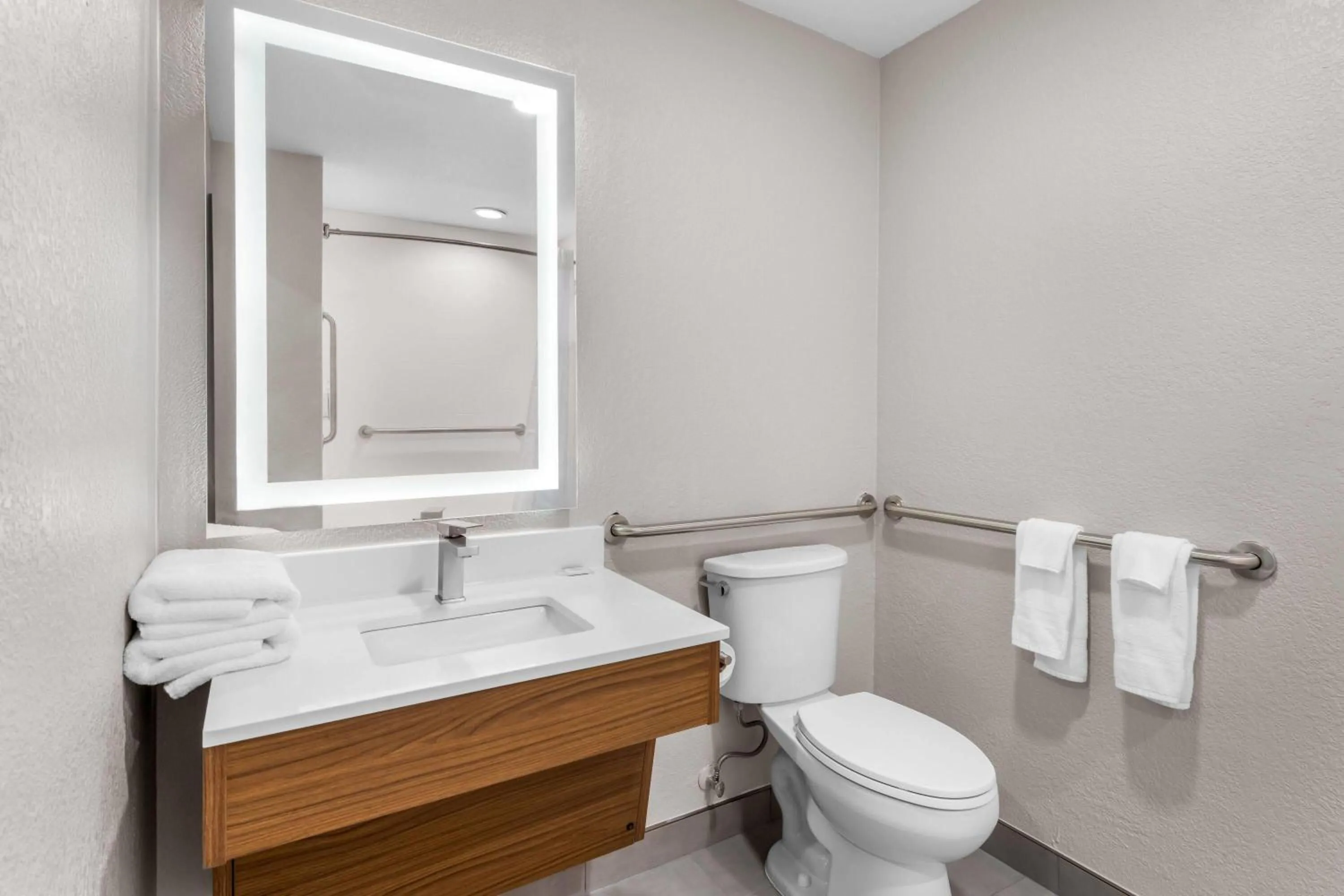 Bathroom in Days Inn & Suites by Wyndham Brandon Amphitheater