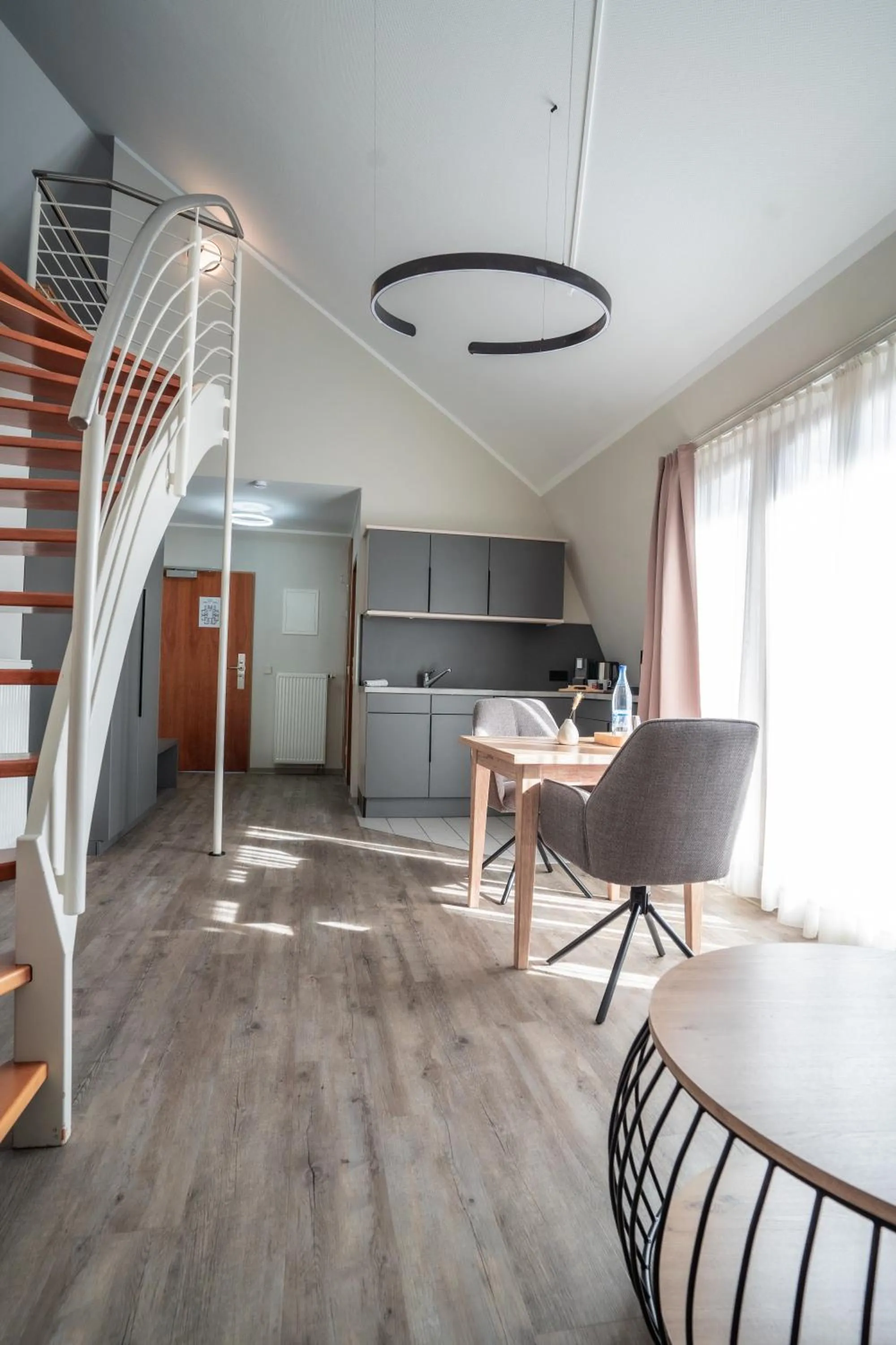 Kitchen or kitchenette in Hotel CityHome am Kurpark