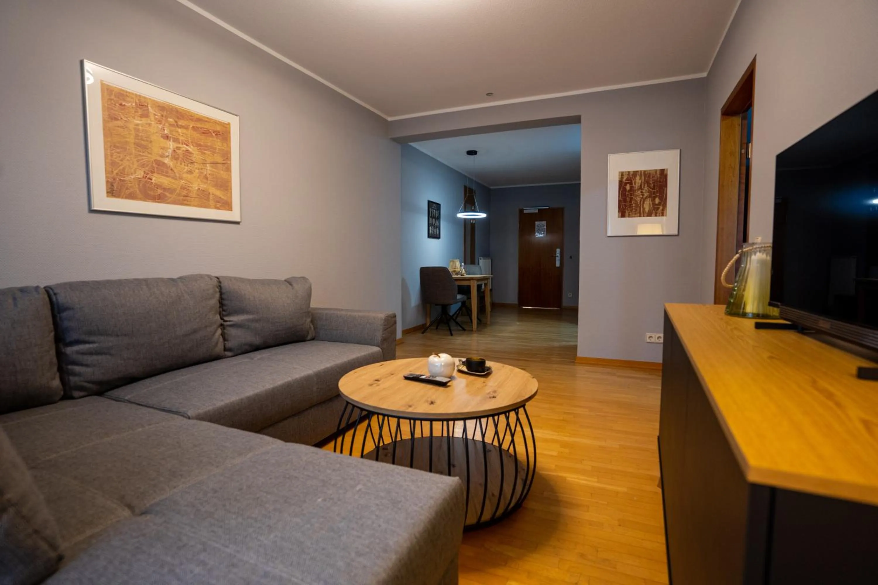 Communal lounge/ TV room in Hotel CityHome am Kurpark