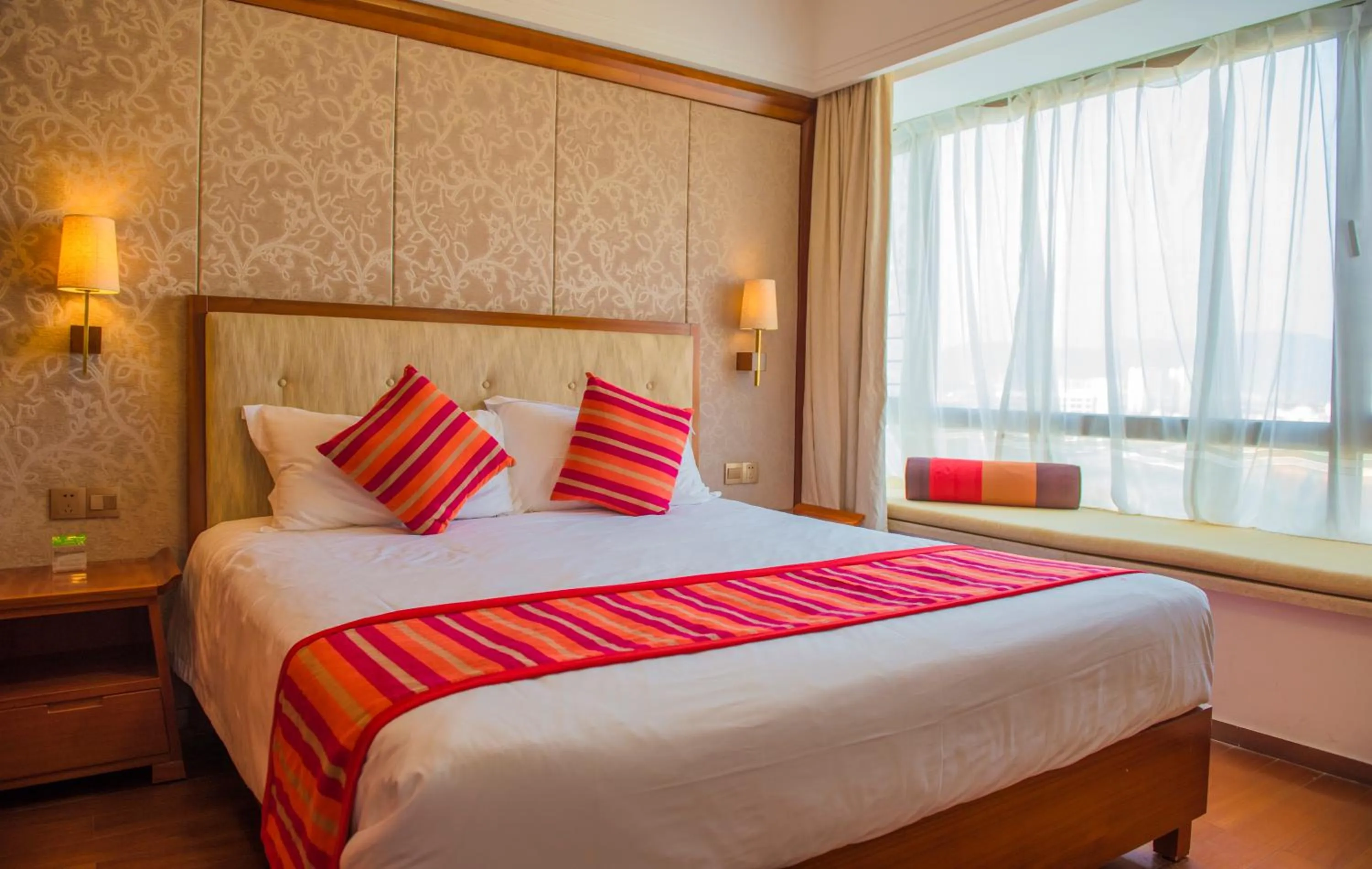 Bed in Sanya Seacube Holiday Hotel