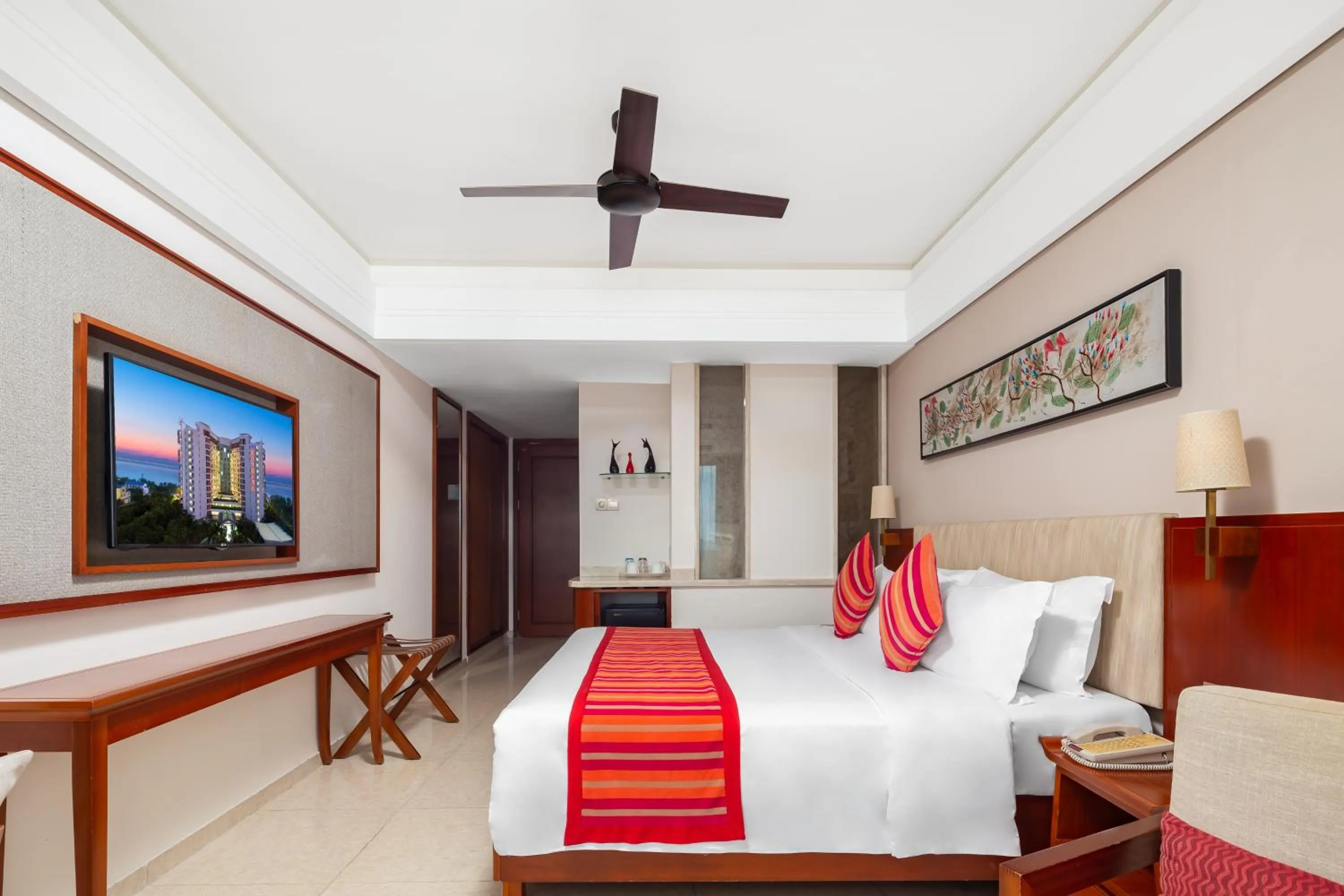 Bed in Sanya Seacube Holiday Hotel