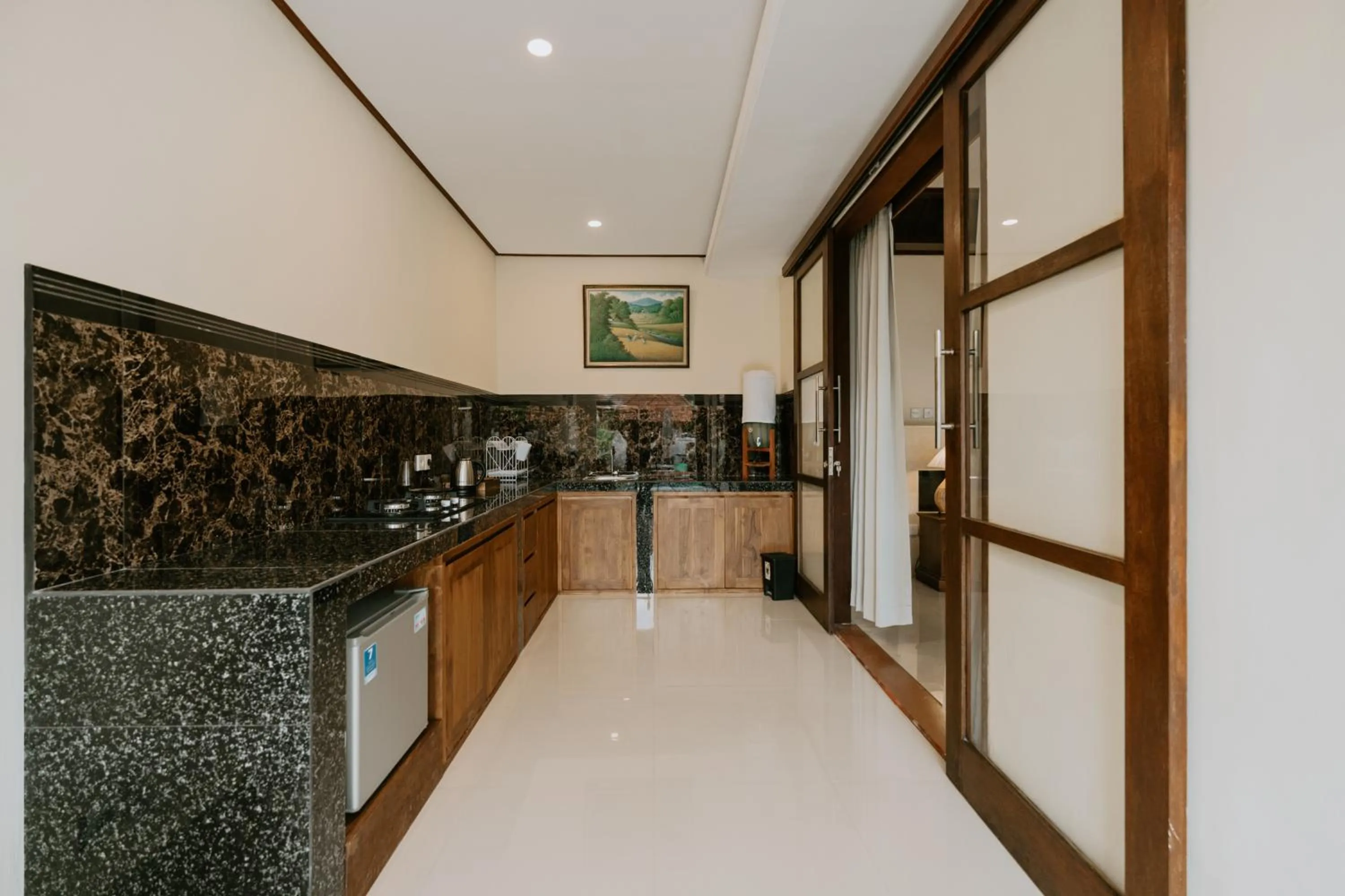 Kitchen or kitchenette in Meng Bengil Villa