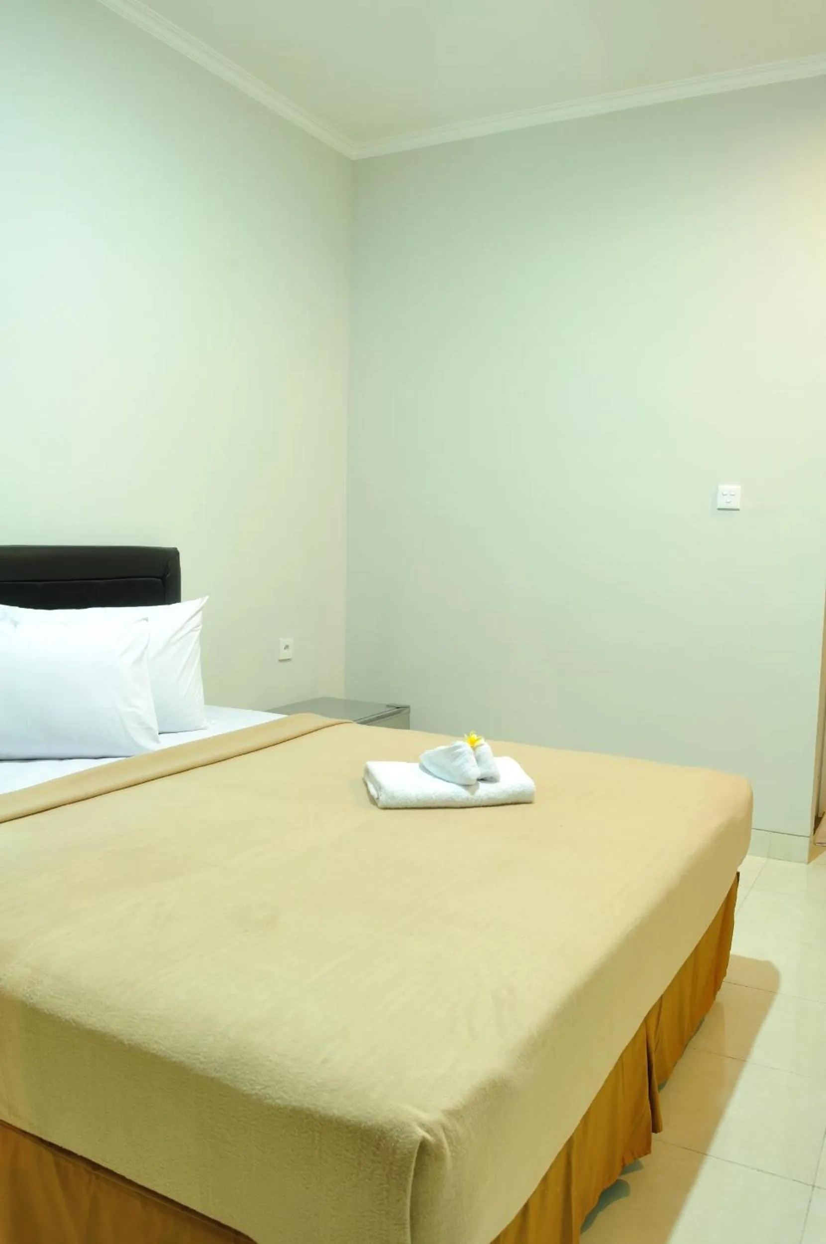 Bed in Amerta Home Stay Bali