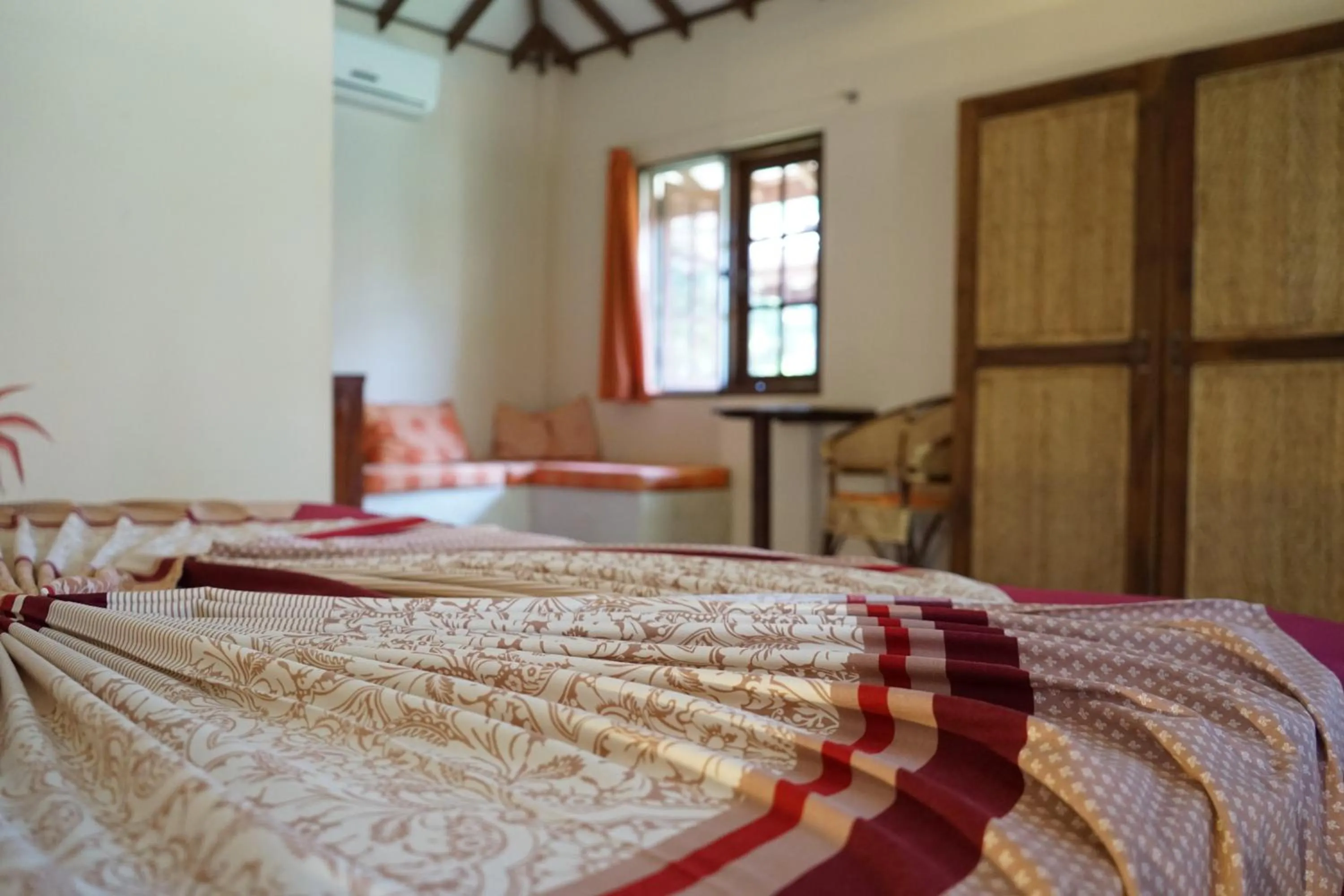 Photo of the whole room, Bed in Puetz Travels Beach Resort