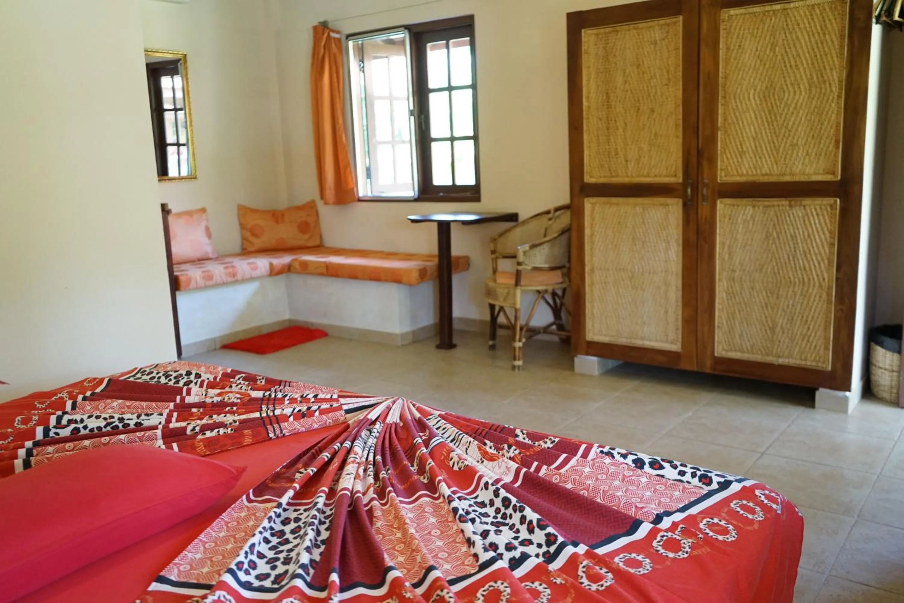 Photo of the whole room, Bed in Puetz Travels Beach Resort