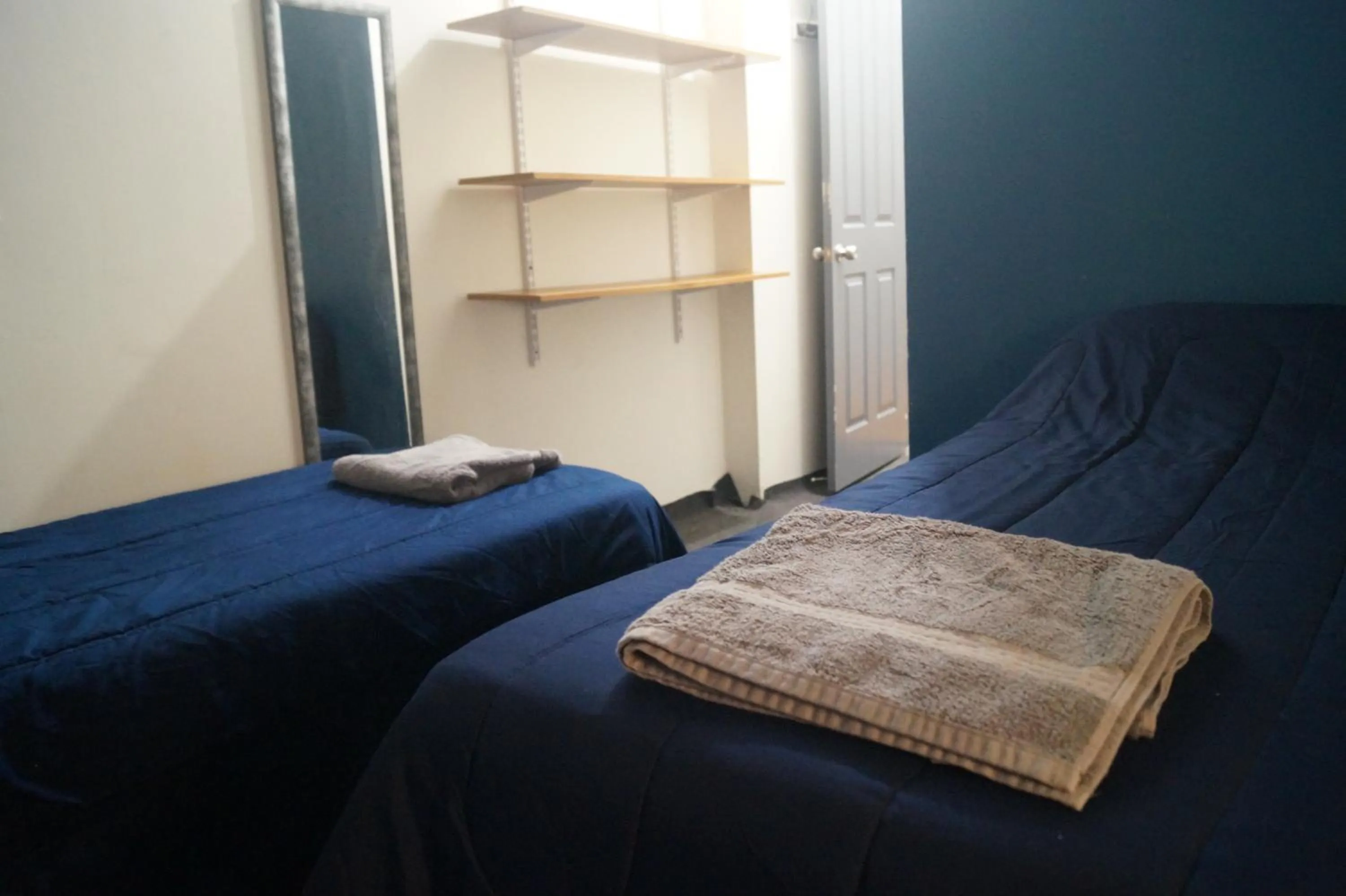 Bed in Macaw Guest House