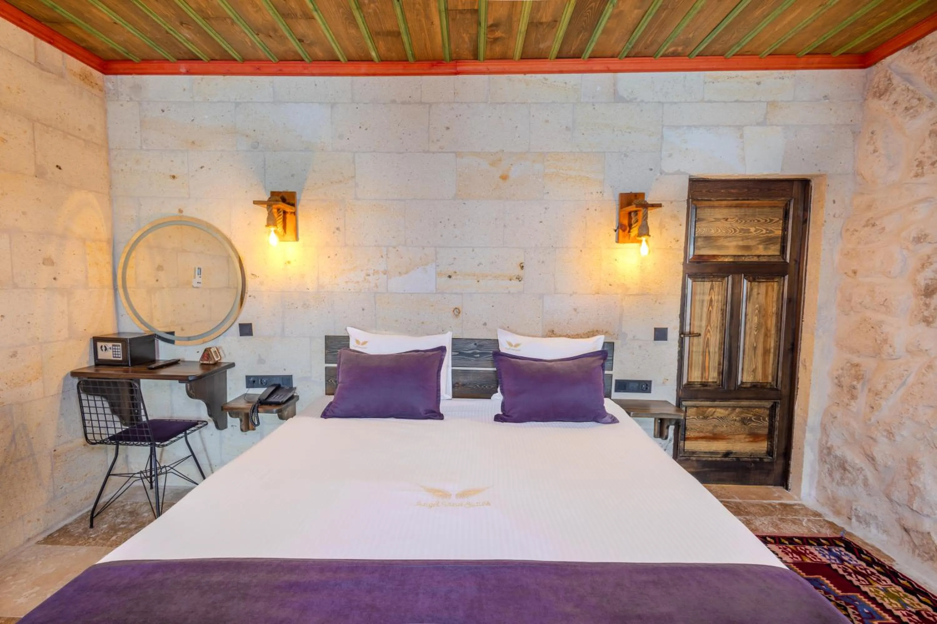 Bed in Angel View Suites