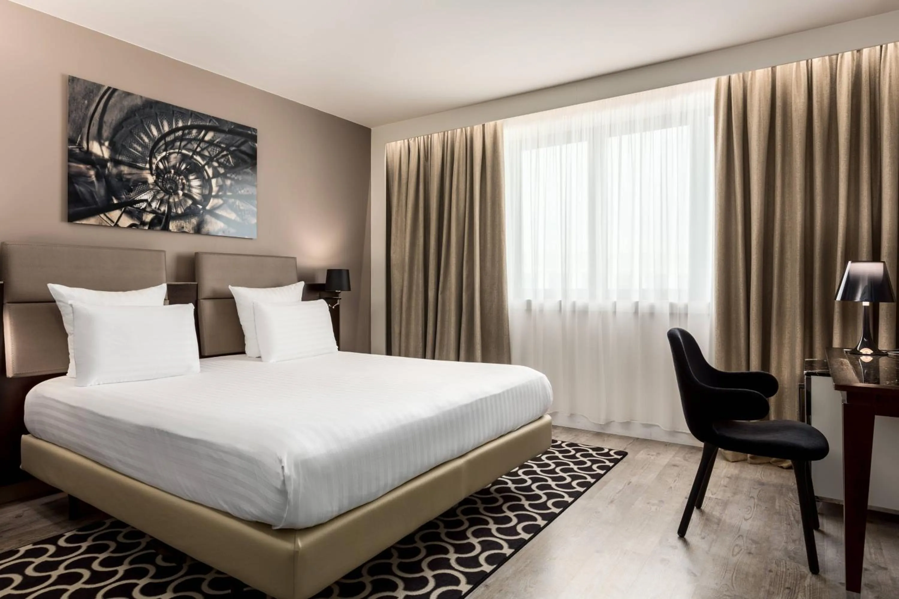 Photo of the whole room, Bed in AC Hotel Paris Porte Maillot by Marriott