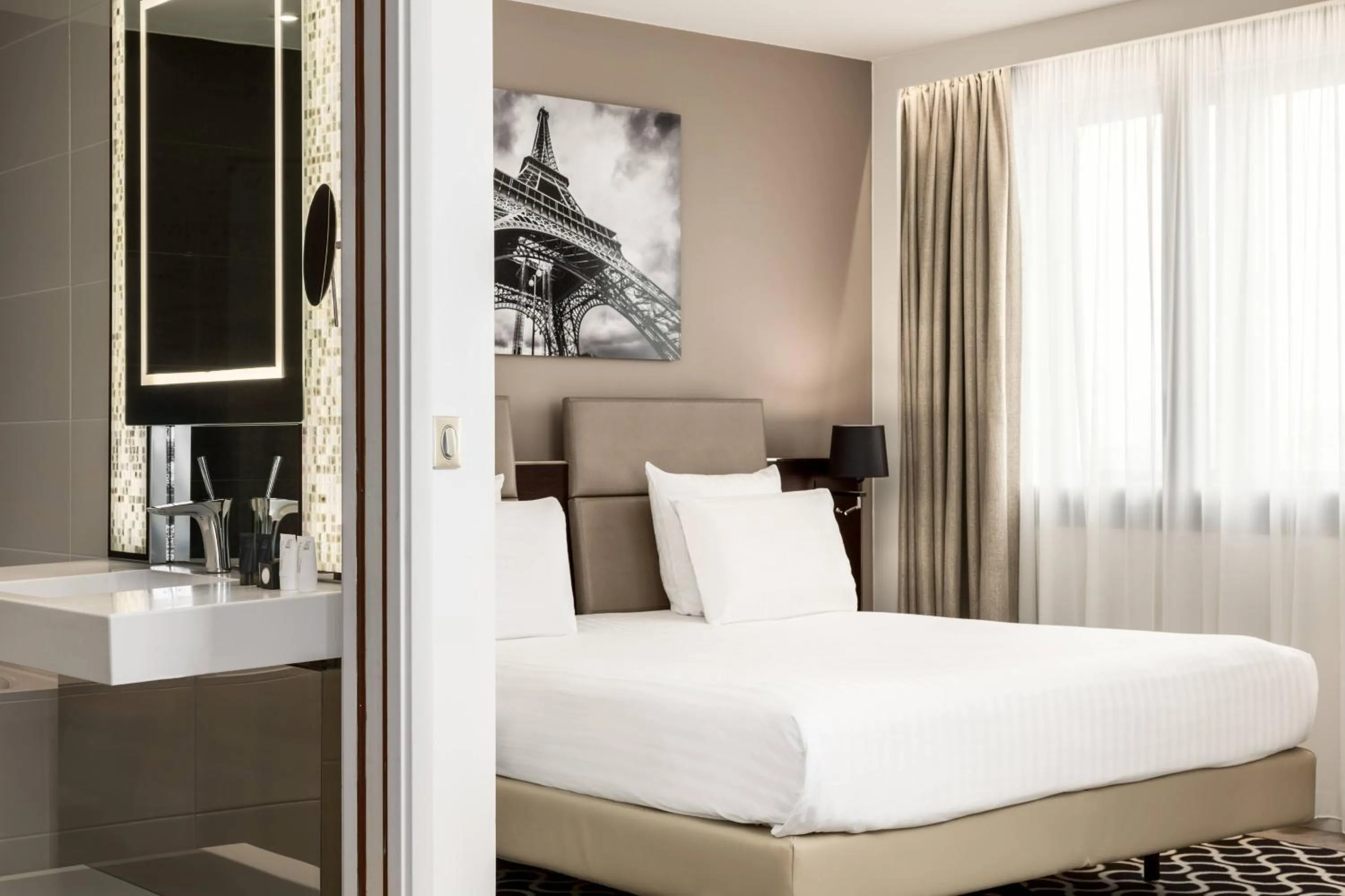 Photo of the whole room, Bed in AC Hotel Paris Porte Maillot by Marriott