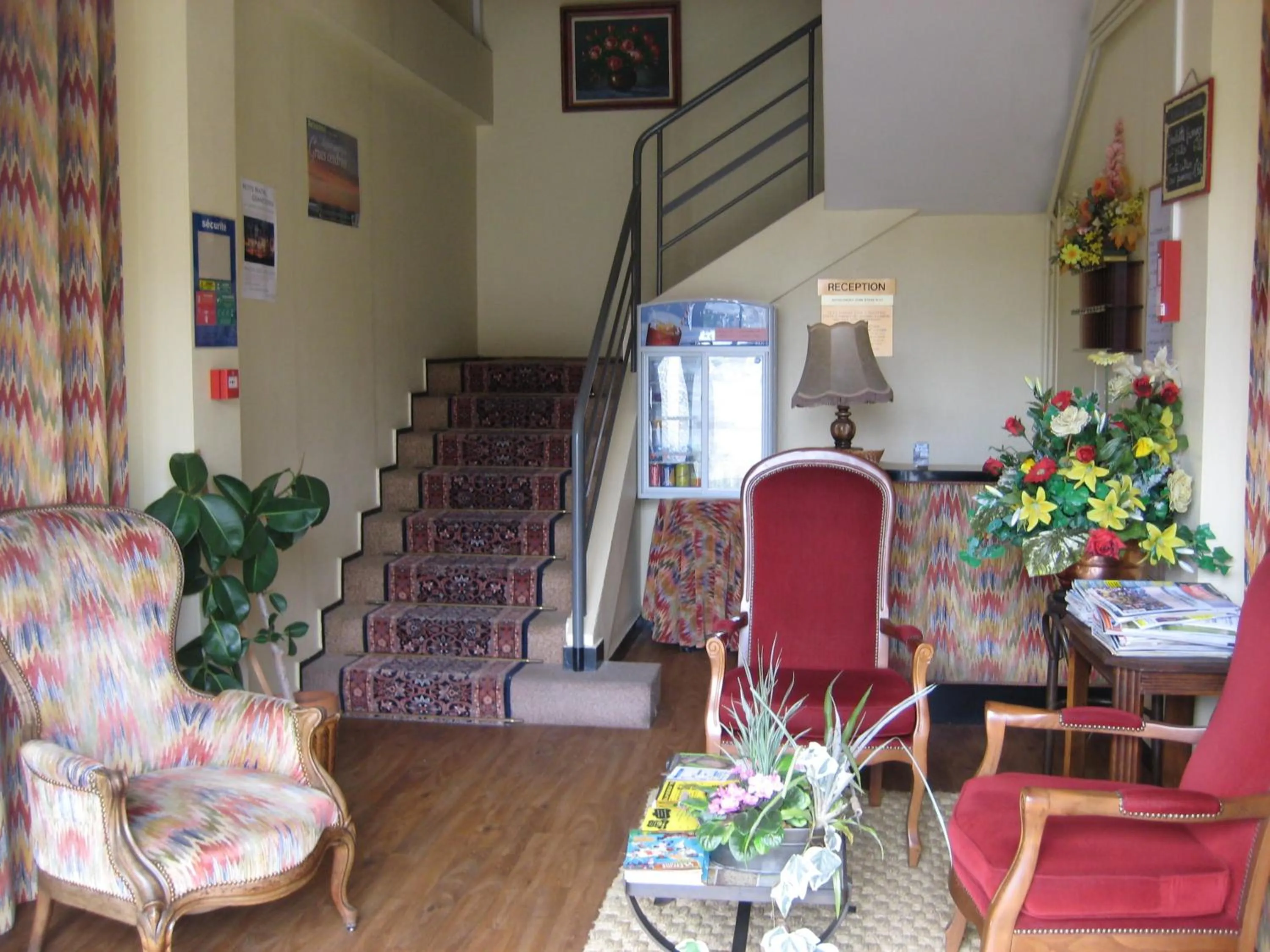 Communal lounge/ TV room in Hotel Bellevue de tradition familiale