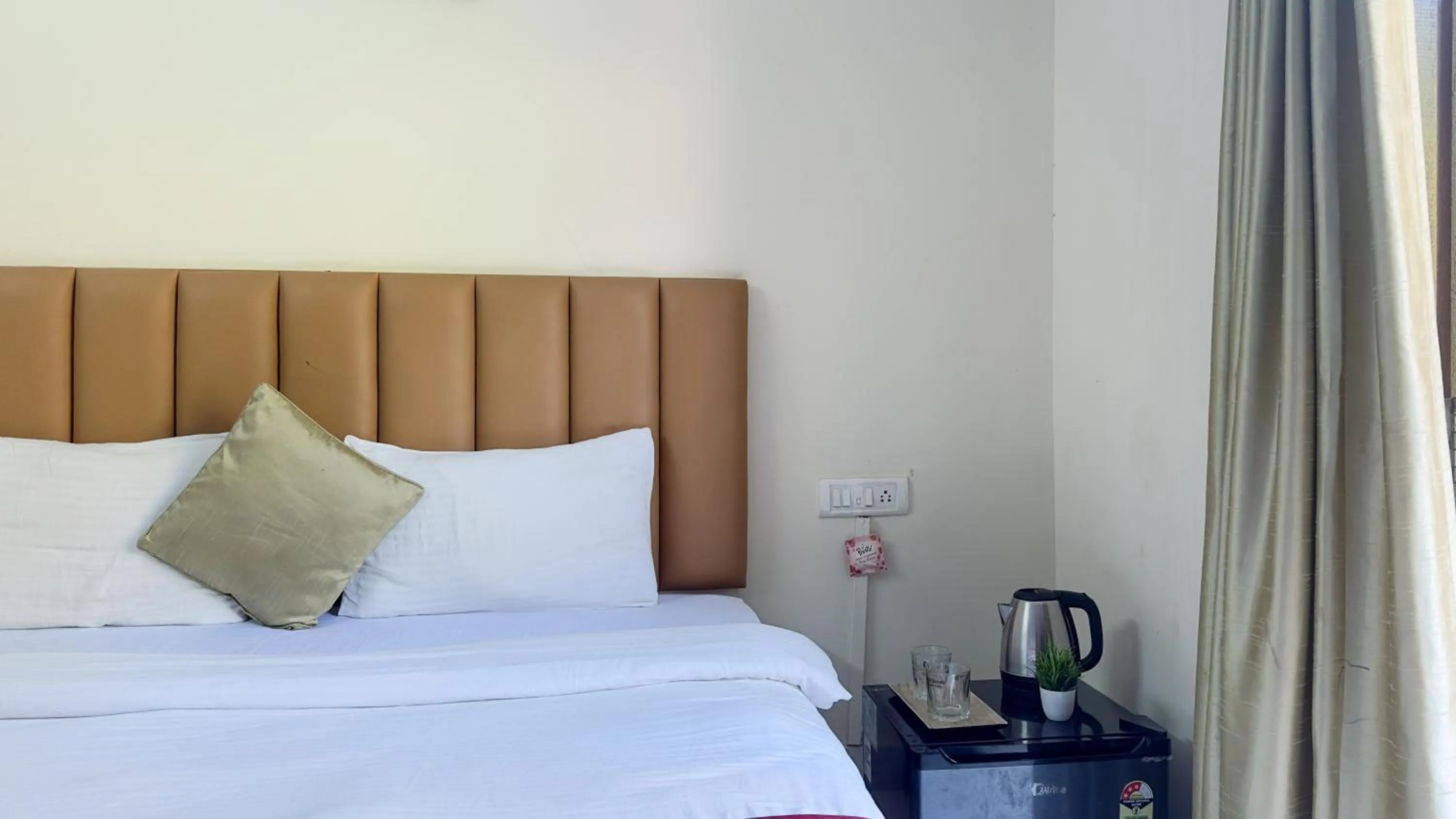 Bed in Hotel Leela Inn