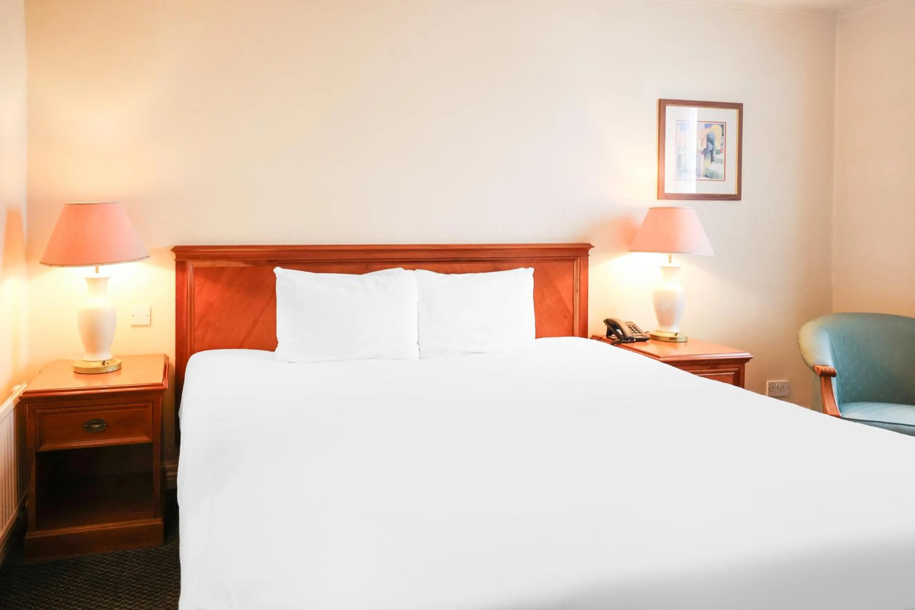 Bed in OYO Tong Park Hotel