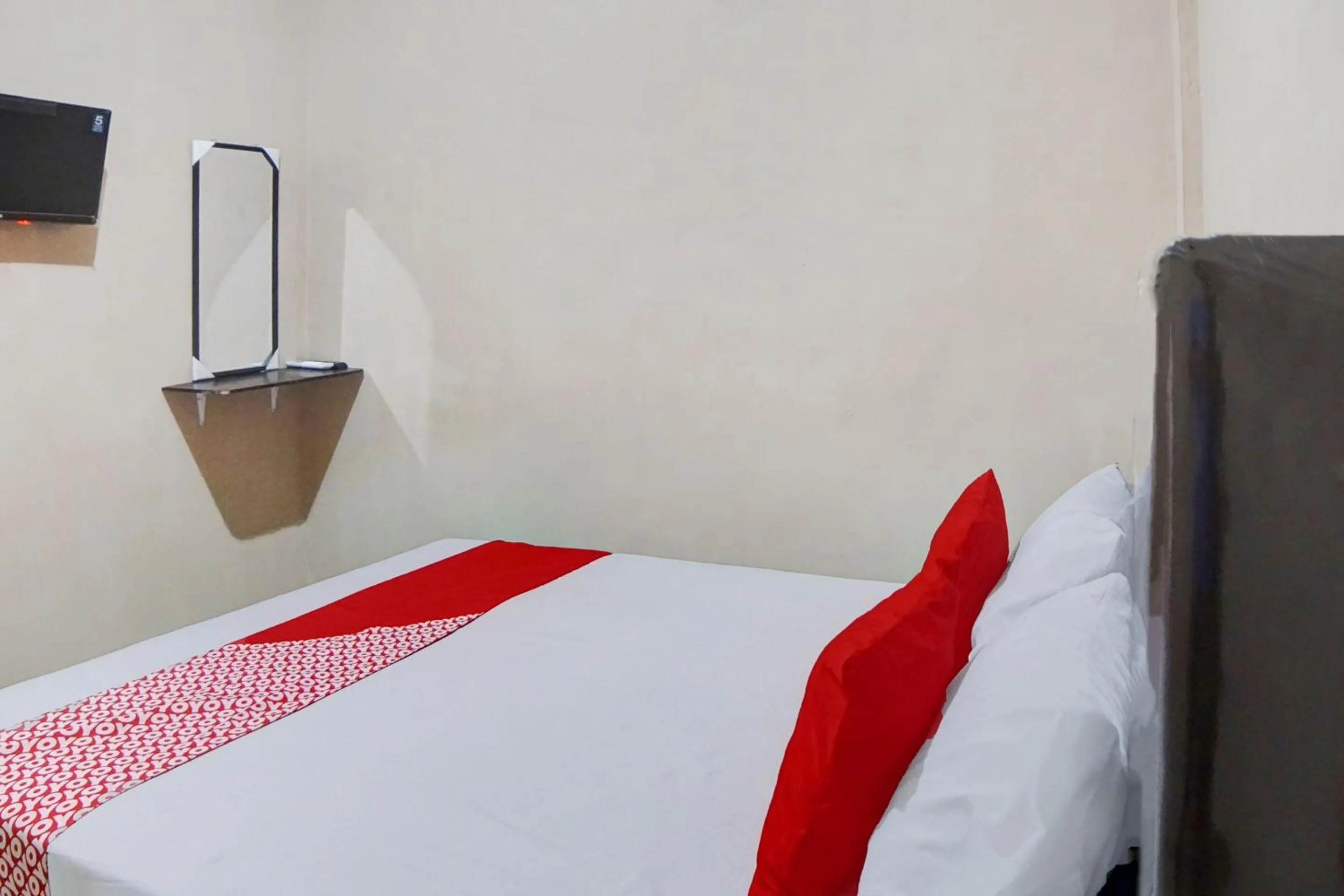 Bedroom, Bed in Hotel O Penginapan Syariah Faster Inn