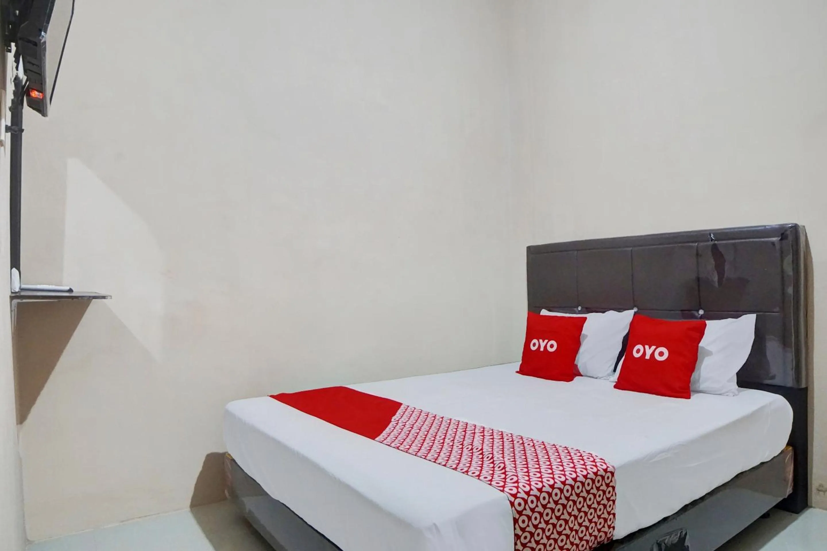 Bedroom, Bed in Hotel O Penginapan Syariah Faster Inn