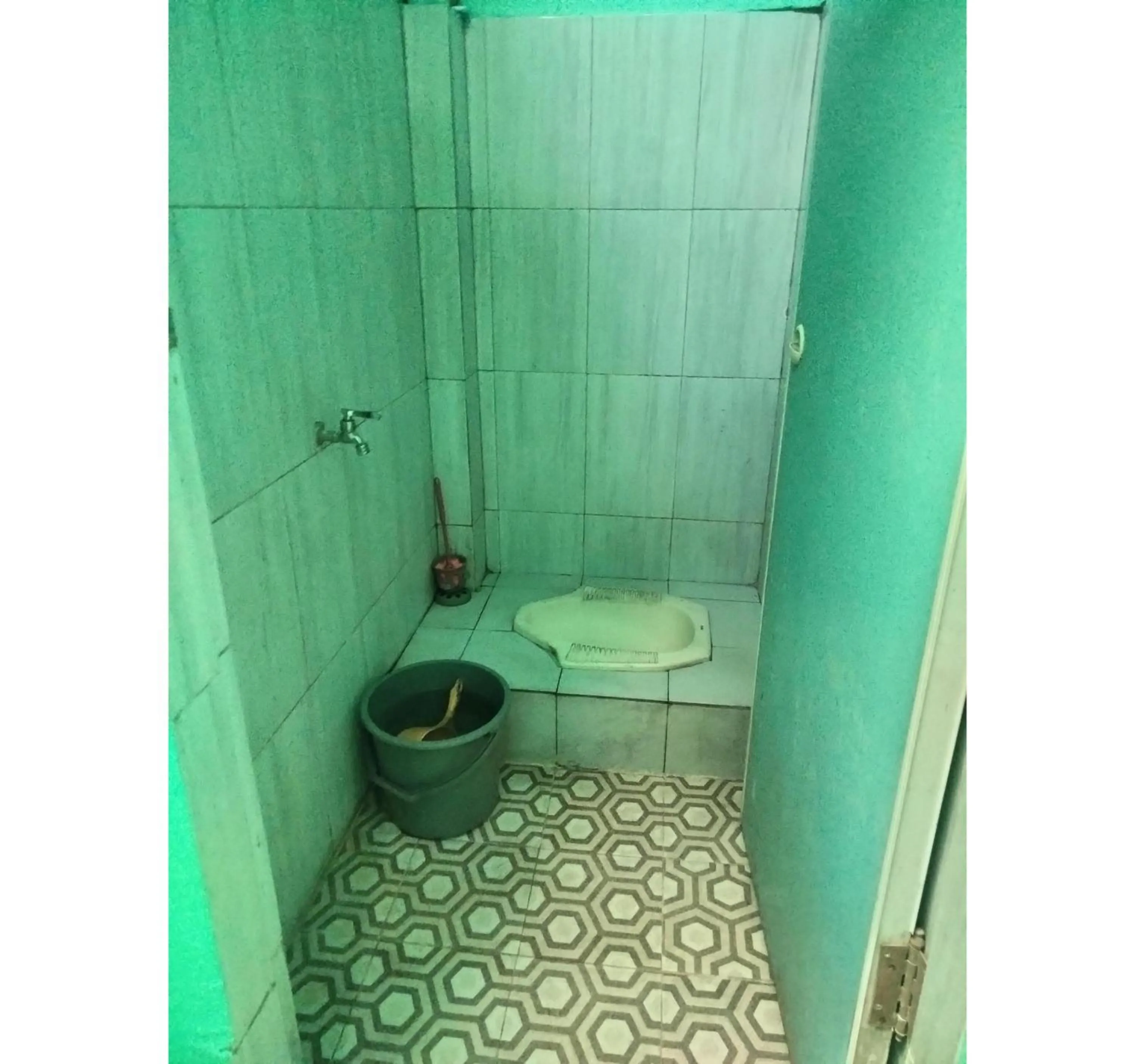 Bathroom in Hotel O Nany Asoka Syariah Near Anyong Cafe Studio