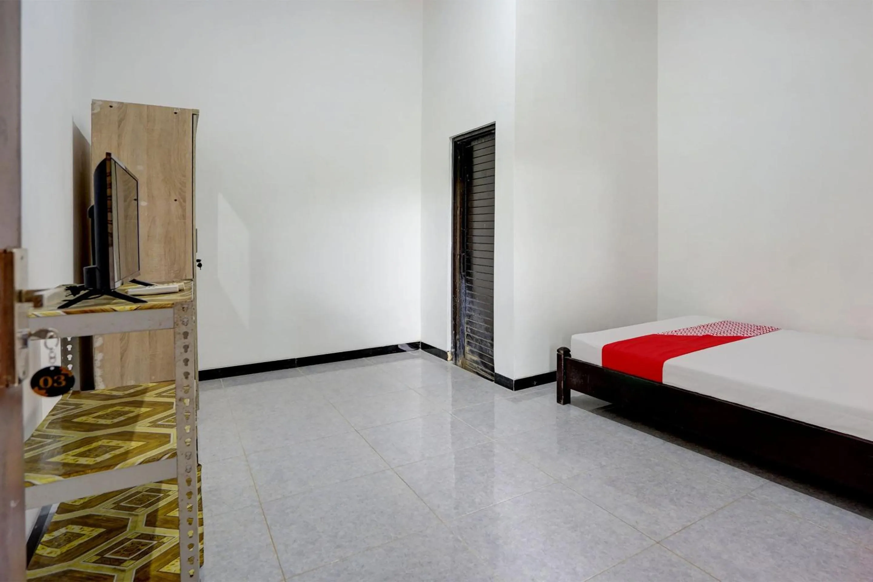 Bedroom in Hotel O Tri D Homestay Syariah