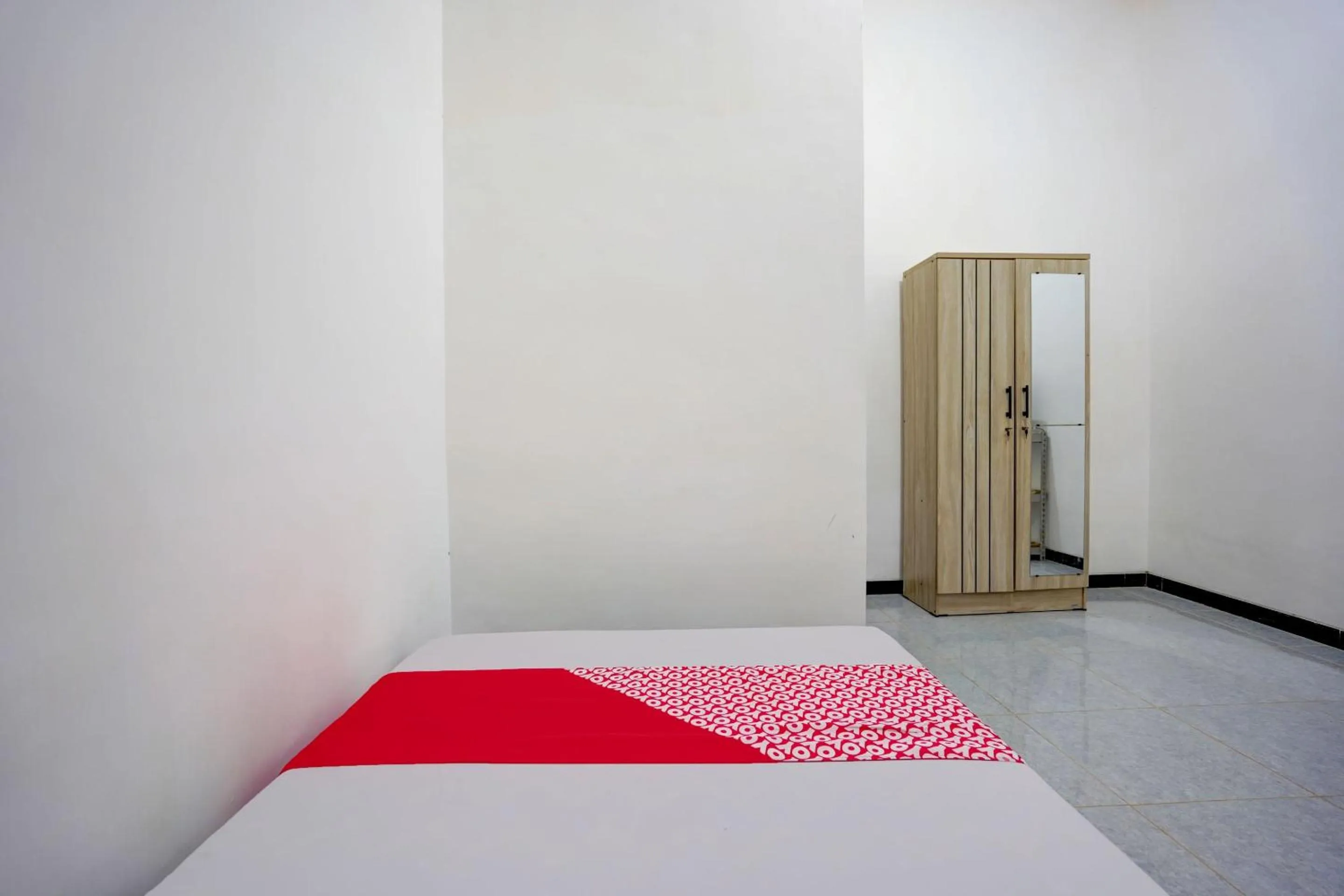 Bedroom in Hotel O Tri D Homestay Syariah