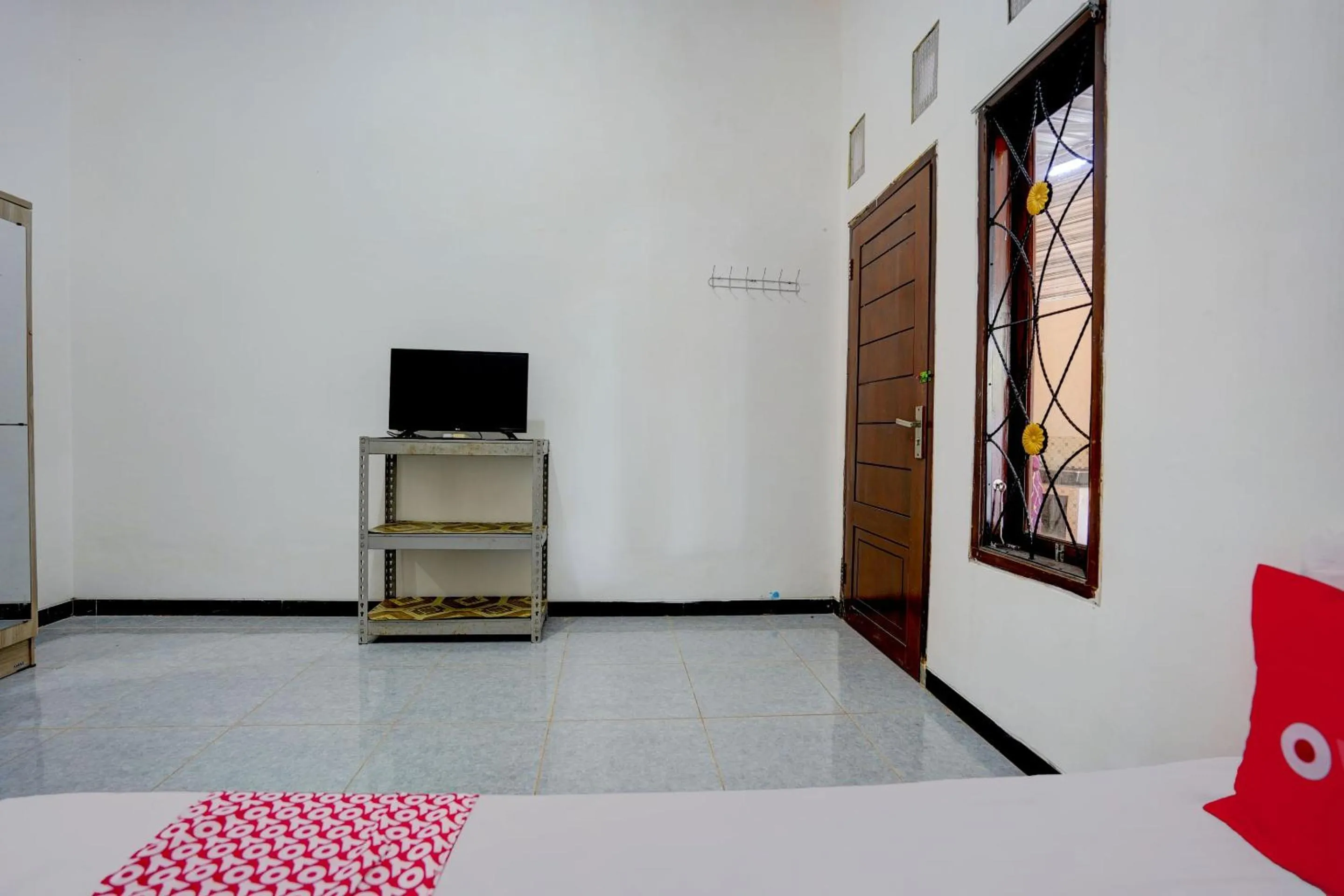 Bedroom in Hotel O Tri D Homestay Syariah
