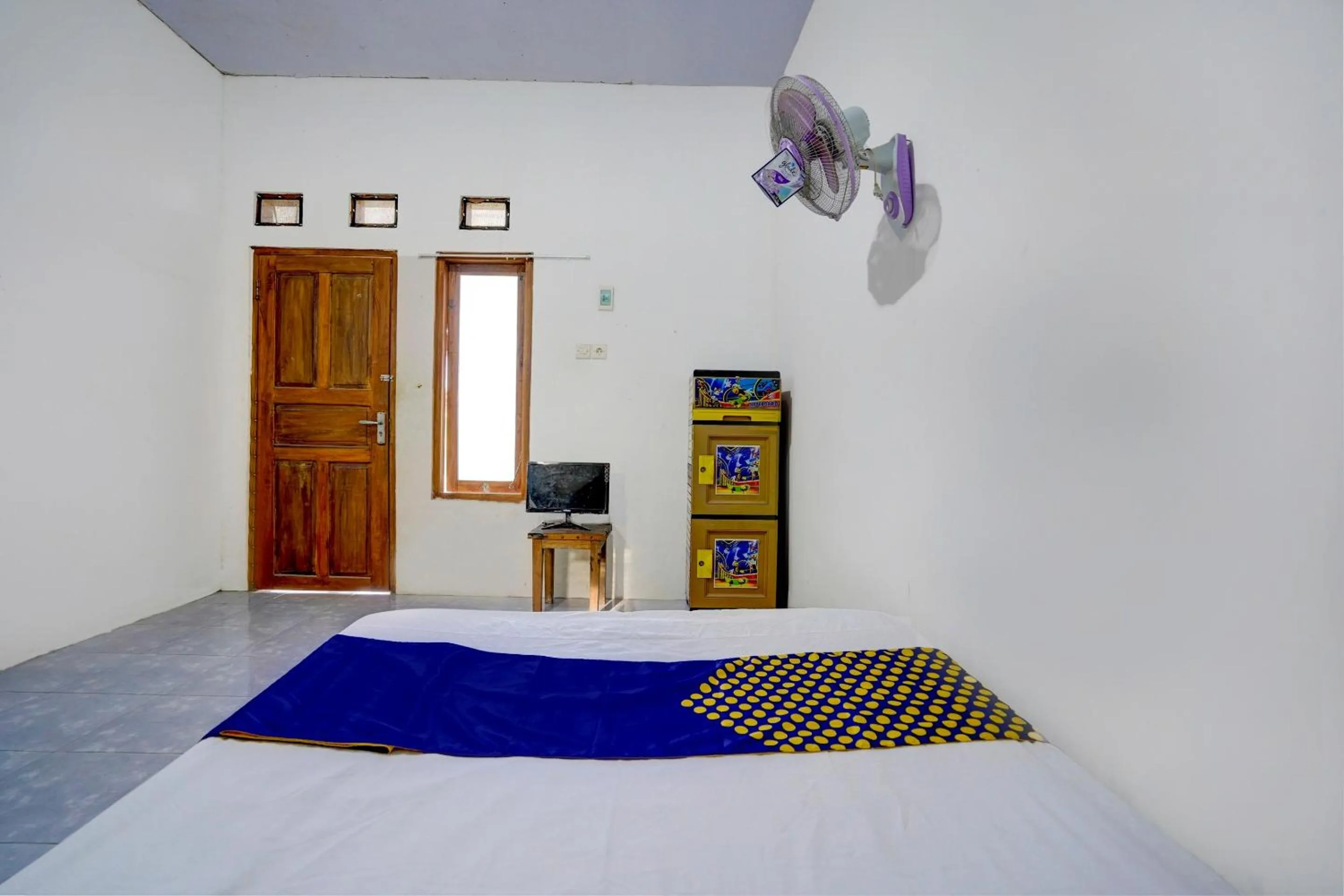 Bedroom, Bed in Hotel O Griya Sandi Syariah Rogojampi