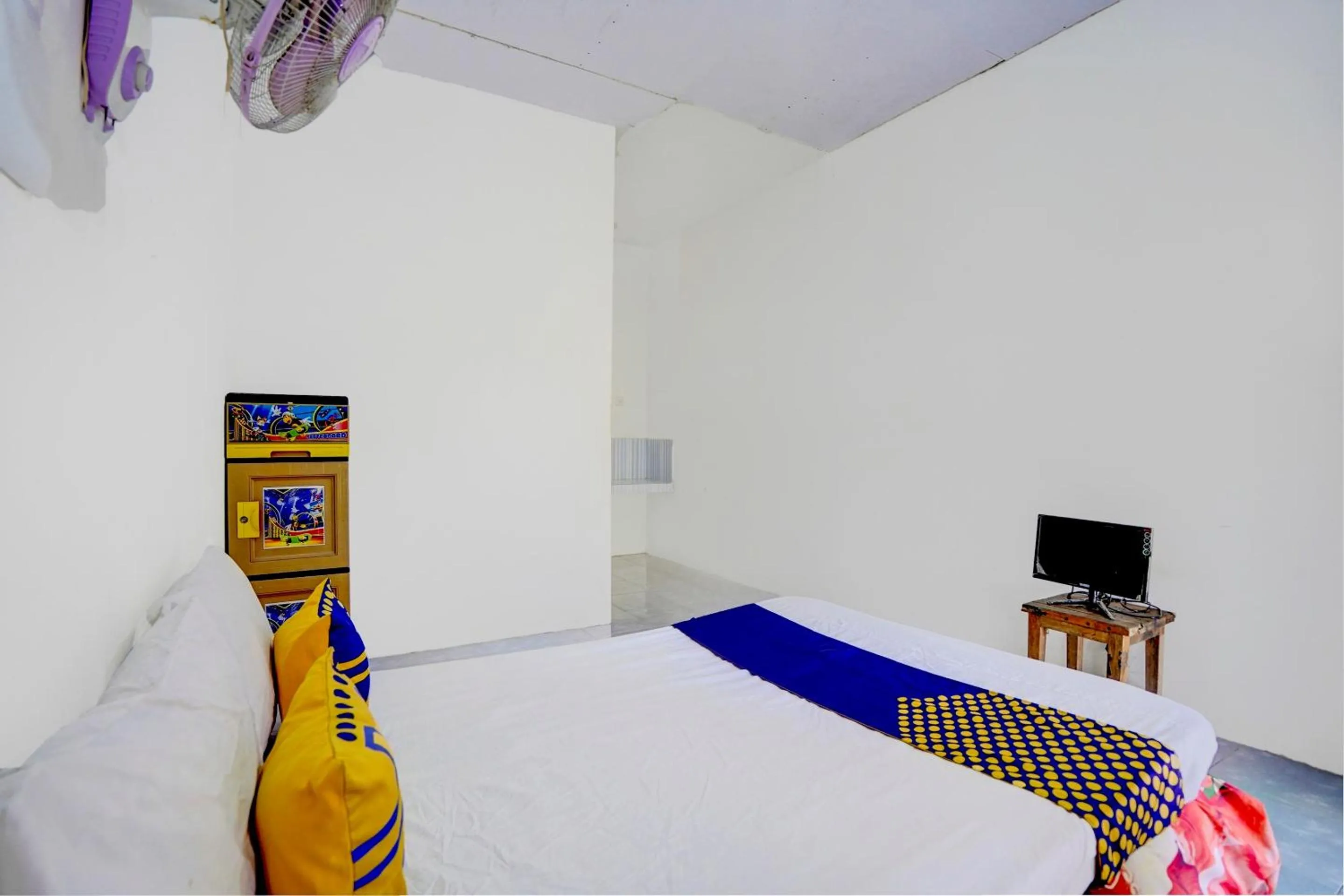 Bedroom, Bed in Hotel O Griya Sandi Syariah Rogojampi