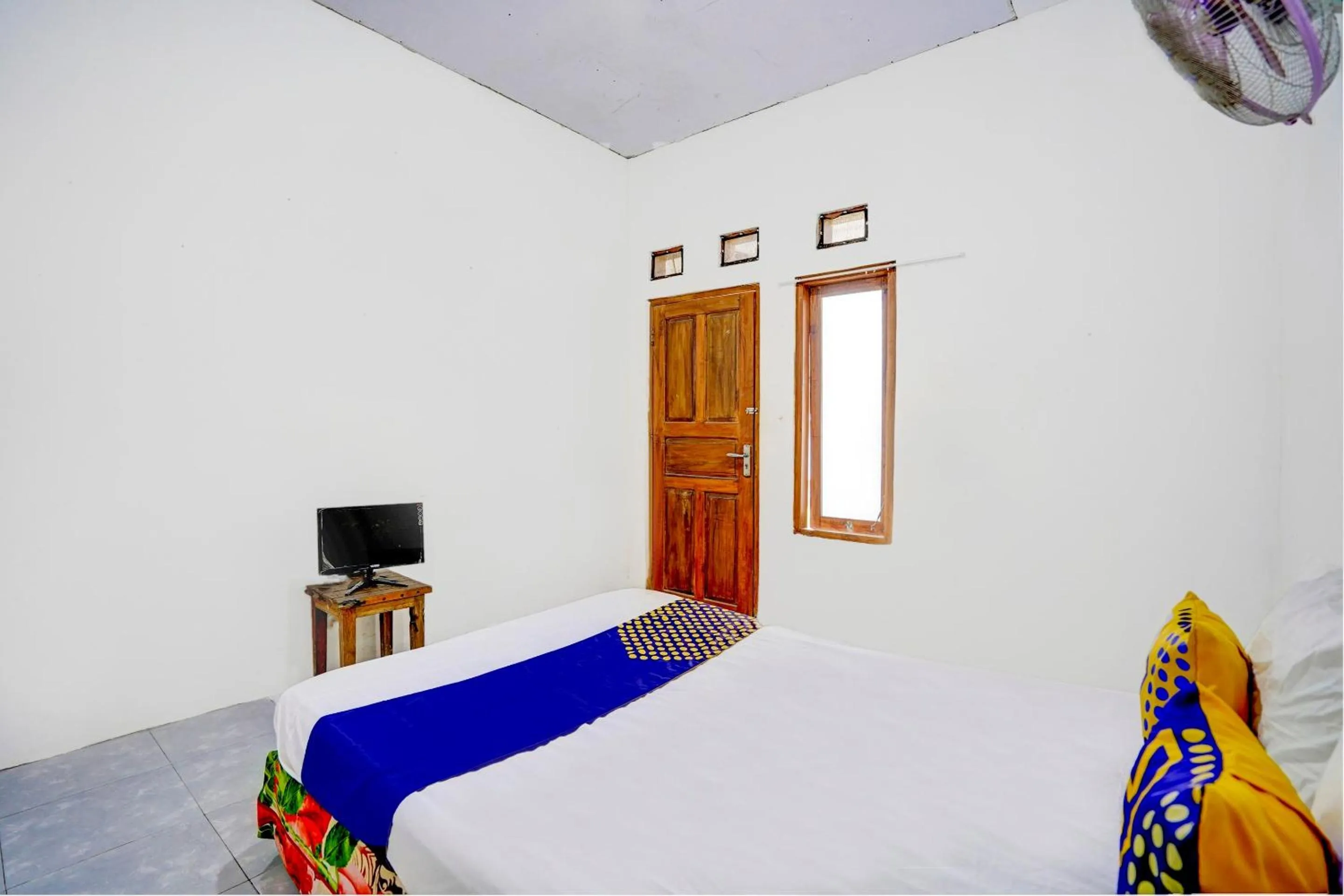 Bedroom, Bed in Hotel O Griya Sandi Syariah Rogojampi