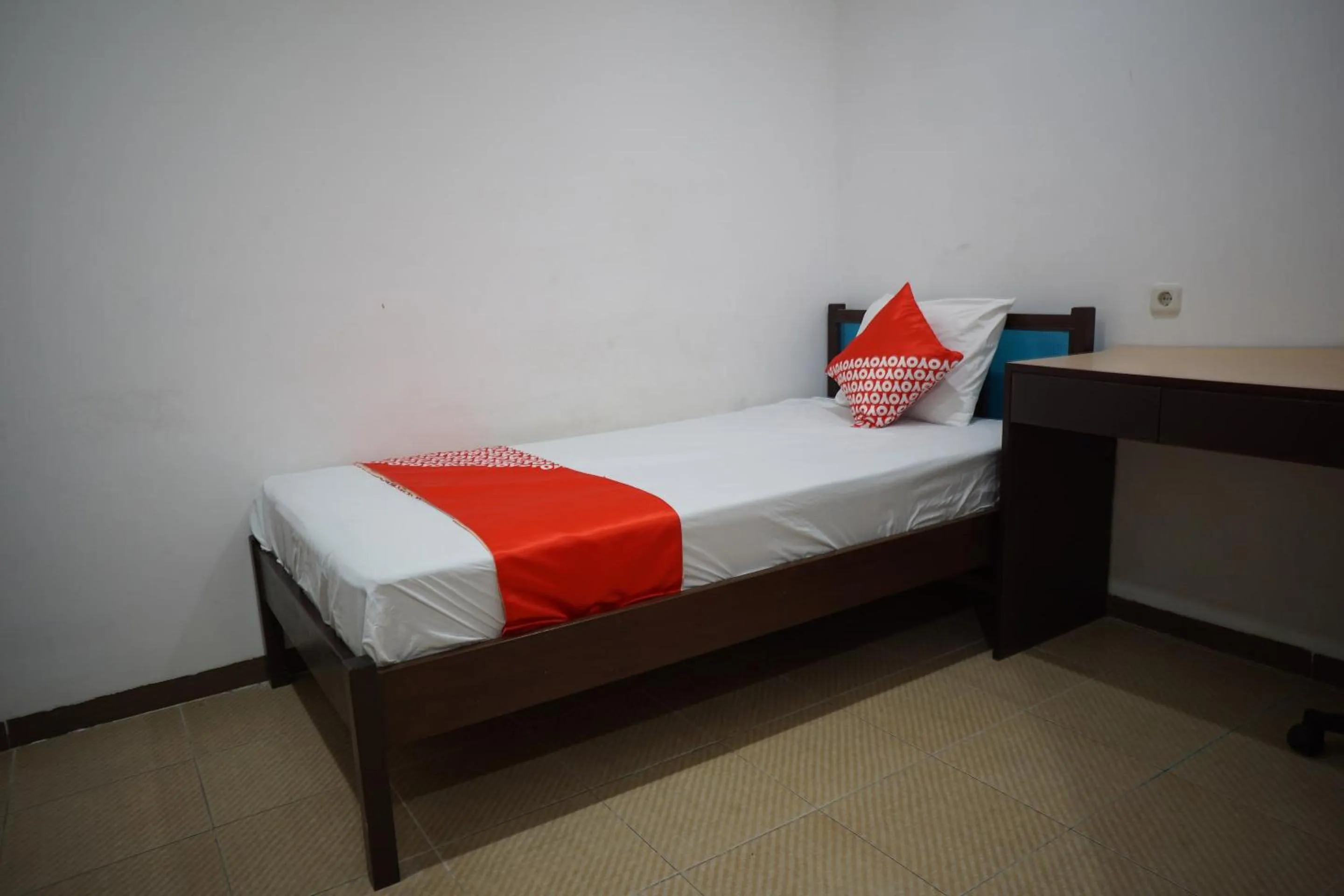 Bedroom in OYO 92863 Hotel Blessing