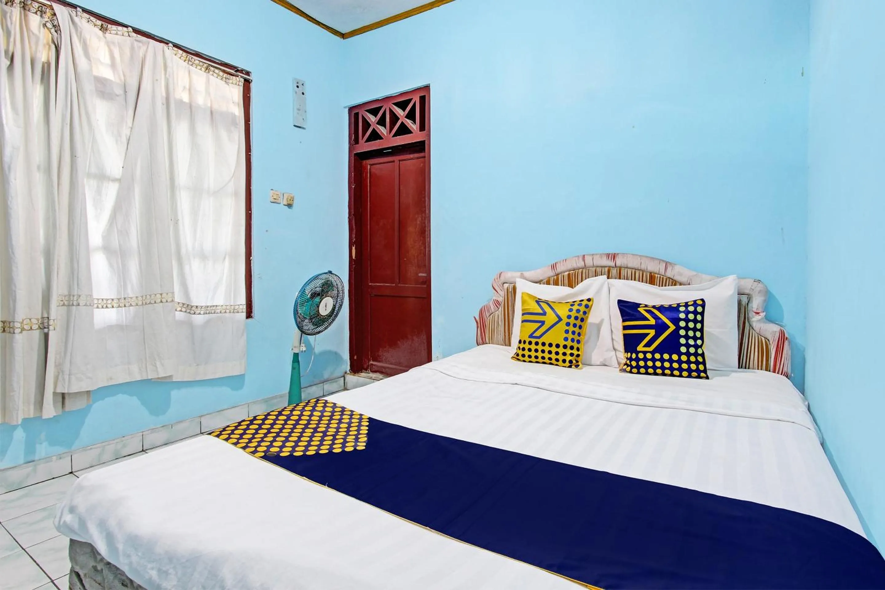 Bedroom in SPOT ON 92873 Losmen Parikesit