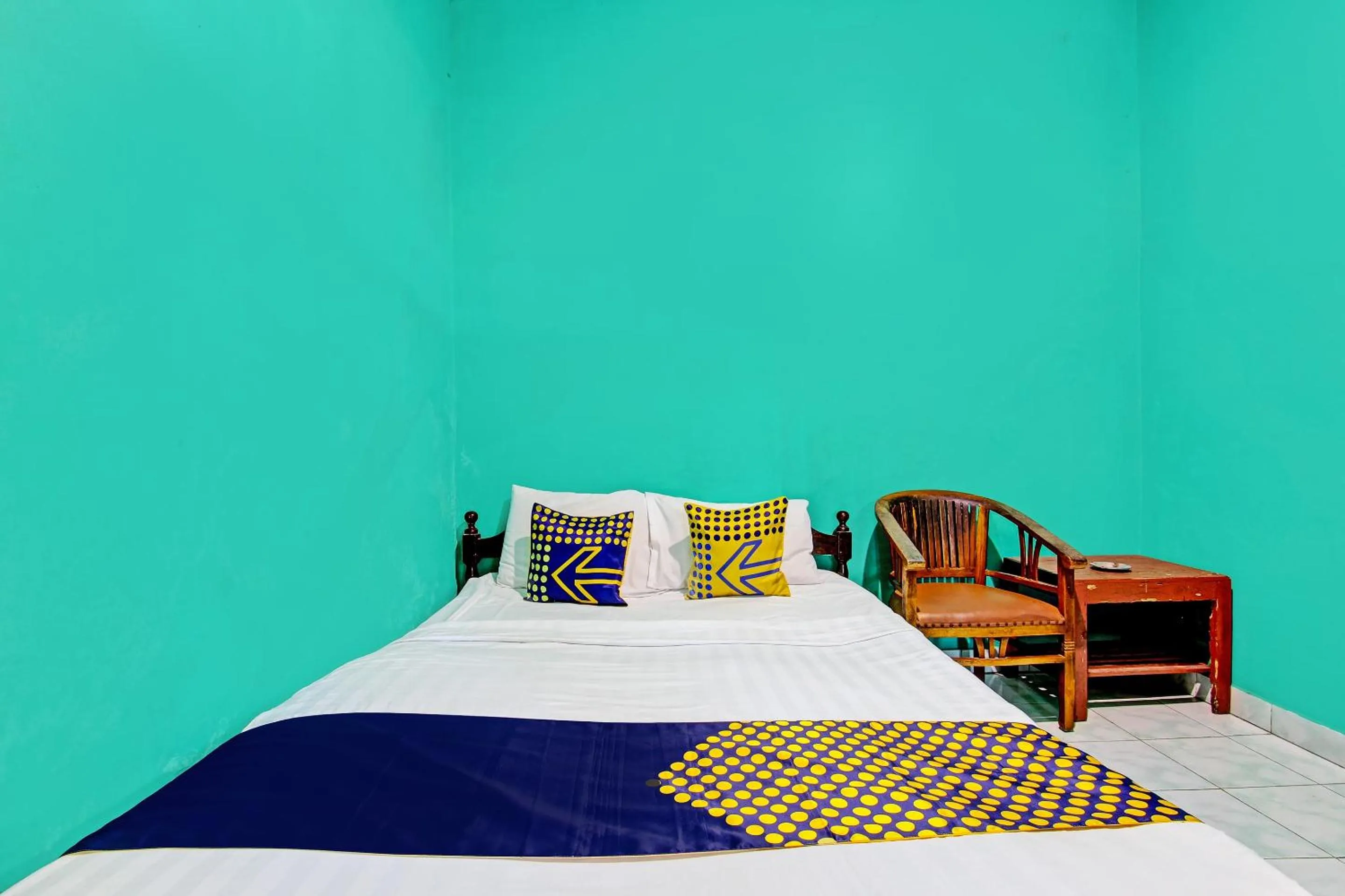 Bedroom in SPOT ON 92873 Losmen Parikesit