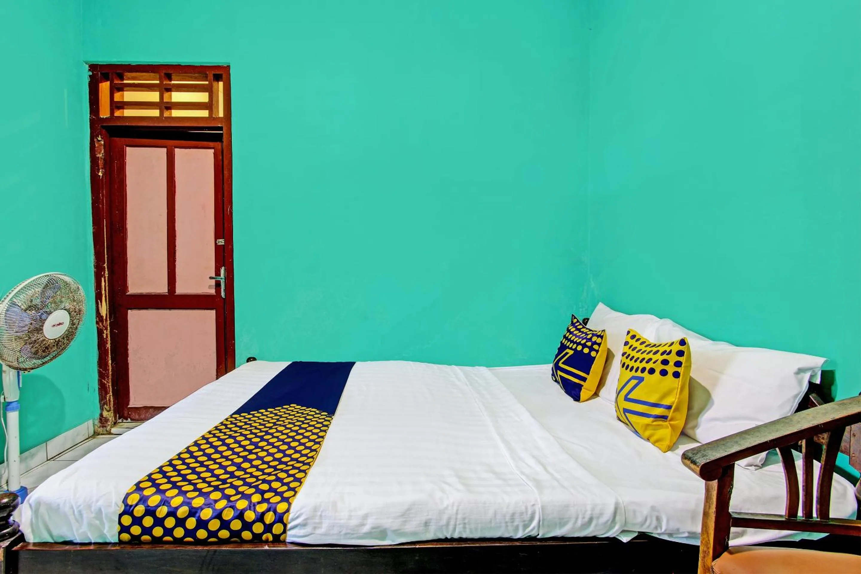 Bedroom in SPOT ON 92873 Losmen Parikesit