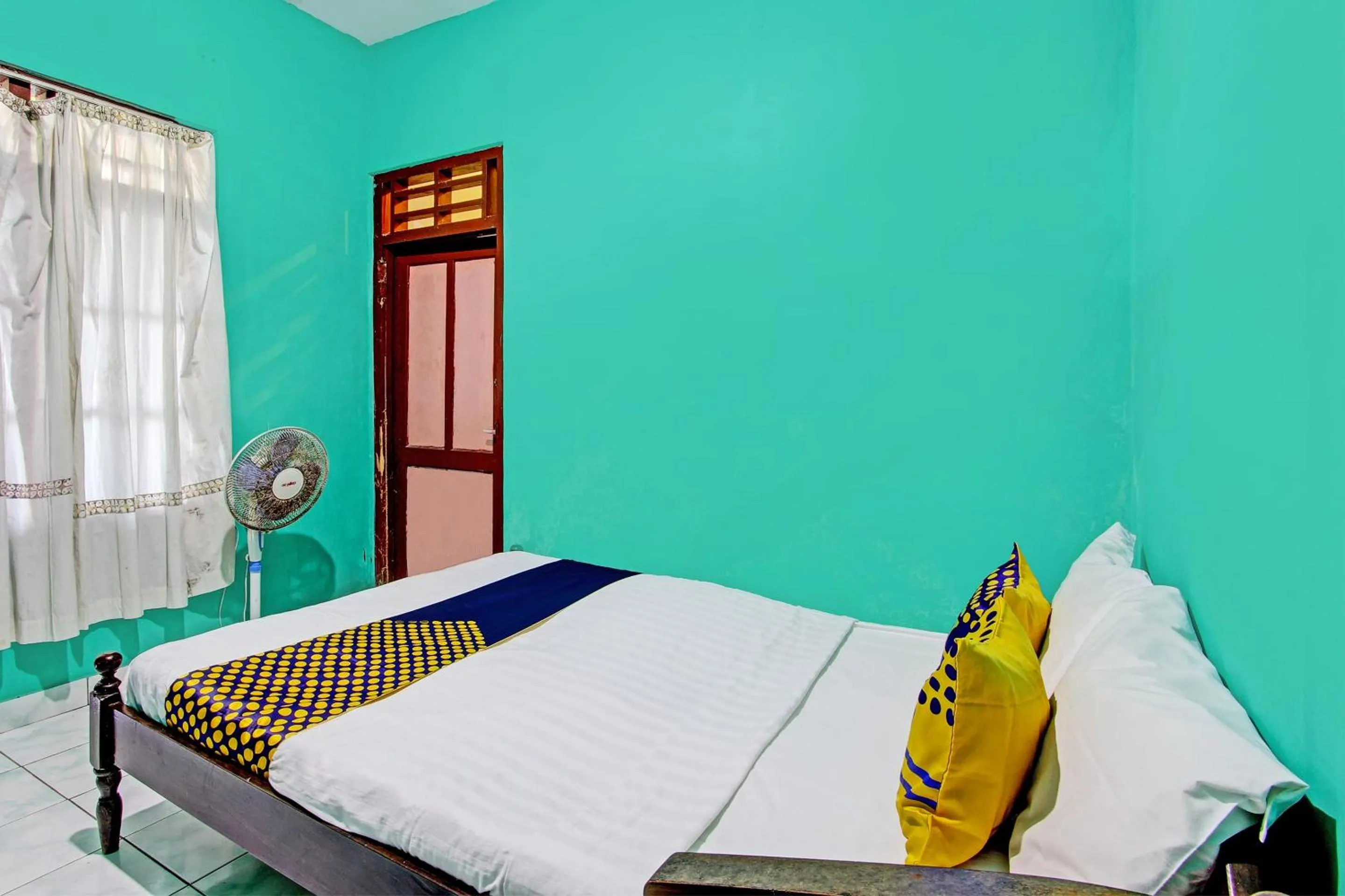 Bedroom in SPOT ON 92873 Losmen Parikesit