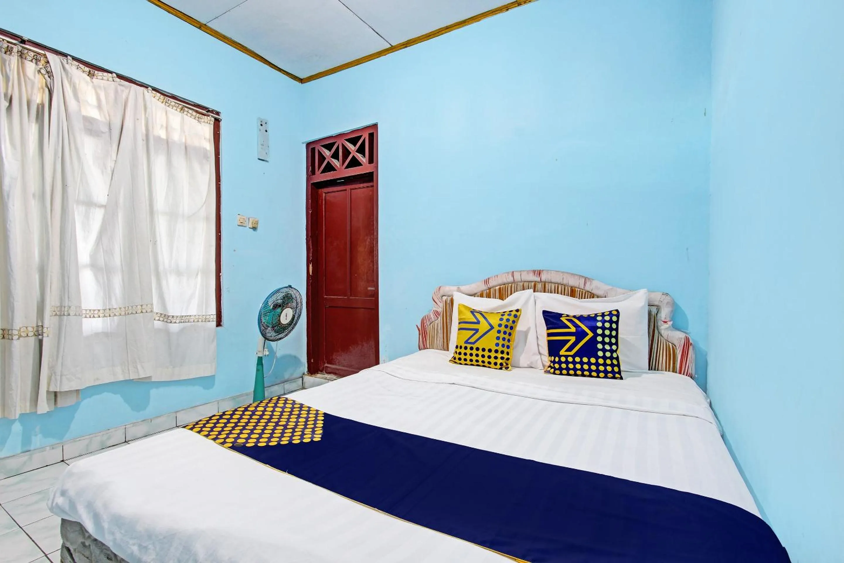 Bedroom in SPOT ON 92873 Losmen Parikesit