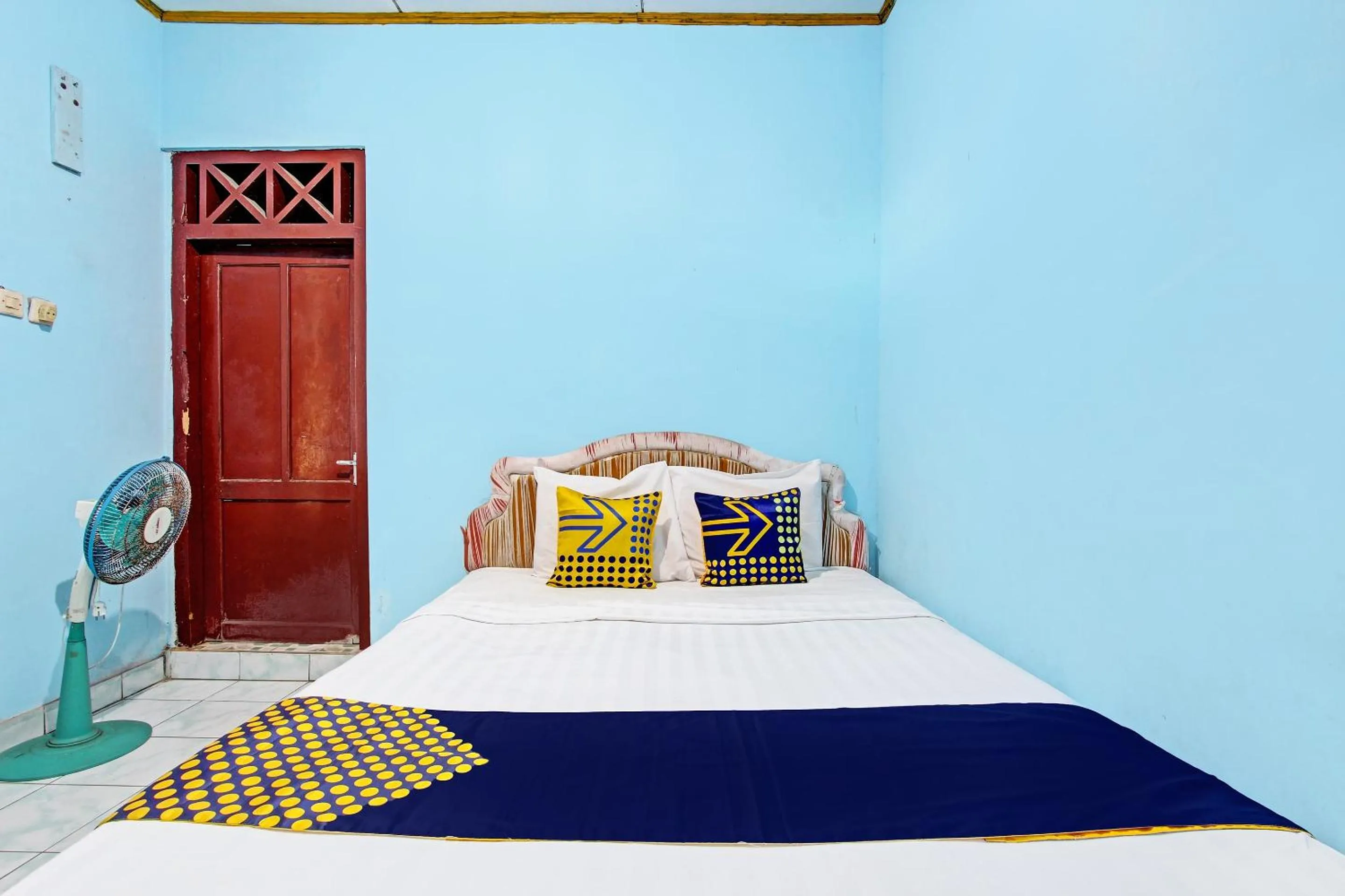 Bedroom in SPOT ON 92873 Losmen Parikesit