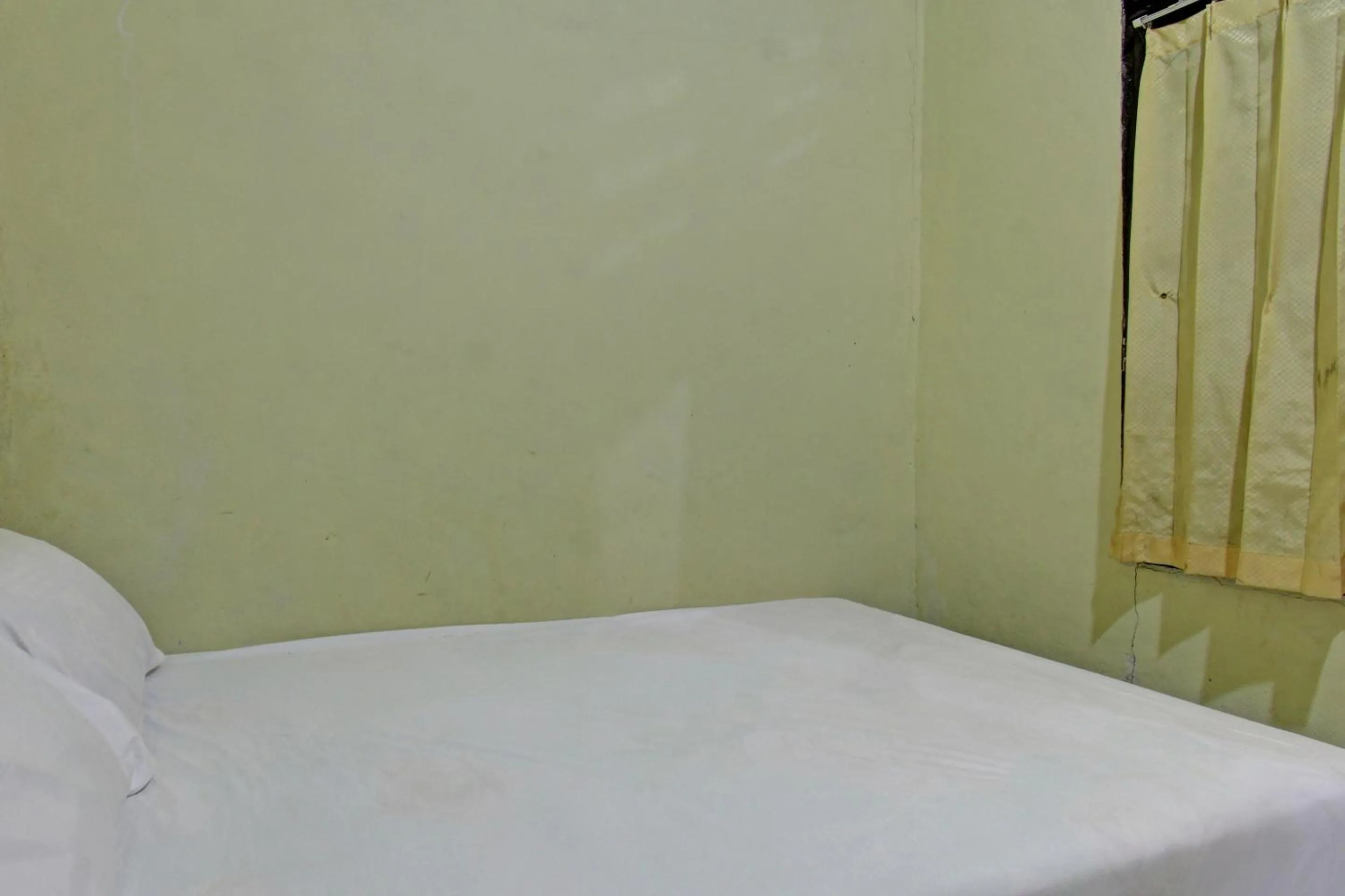 Bedroom, Bed in Hotel O Penginapan 3 Bersaudara Near Pasar Sengkol