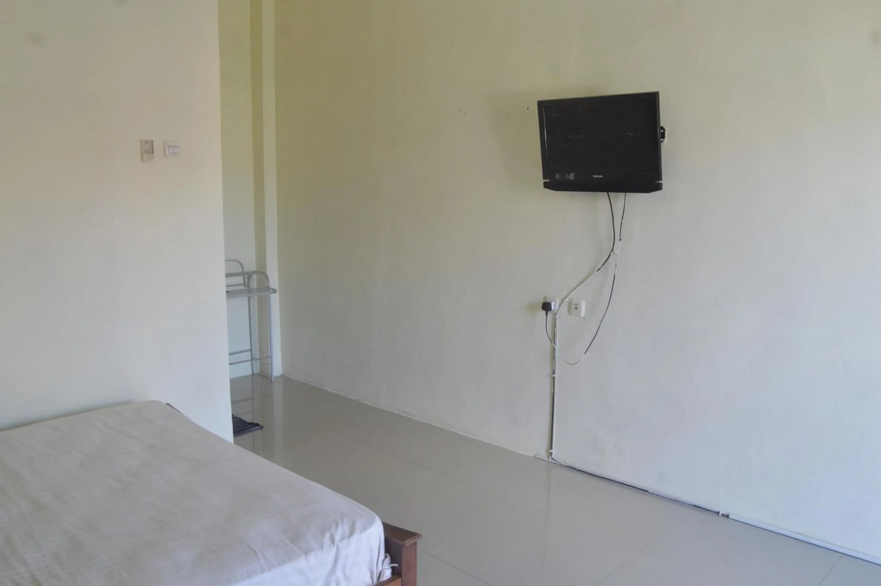 Bedroom, Bed in Hotel O Wisma Nusantara Near SD GMIM Wiau Lapi