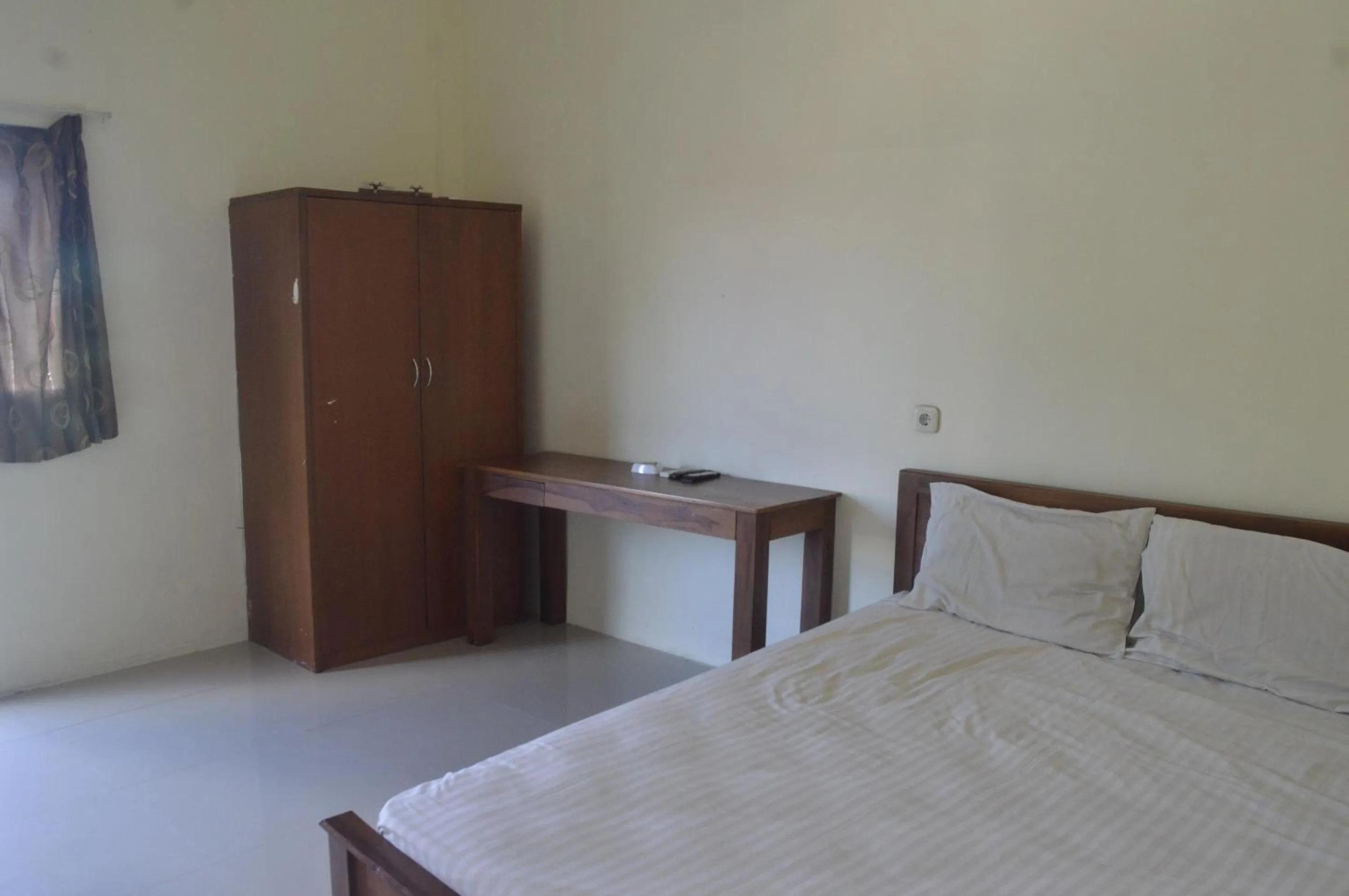 Bedroom, Bed in Hotel O Wisma Nusantara Near SD GMIM Wiau Lapi