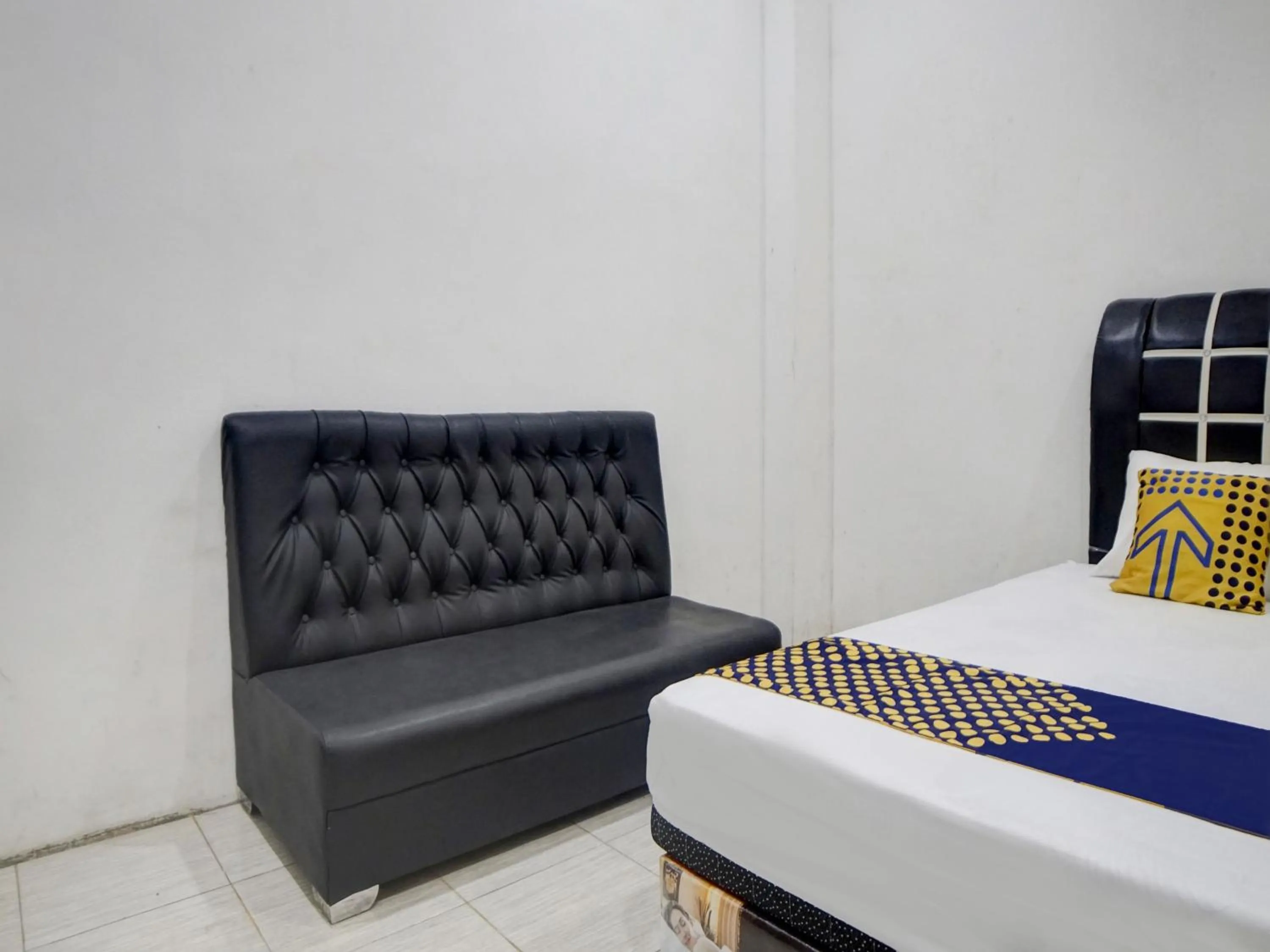 Bedroom, Bed in Hotel O Penginapan Pakam