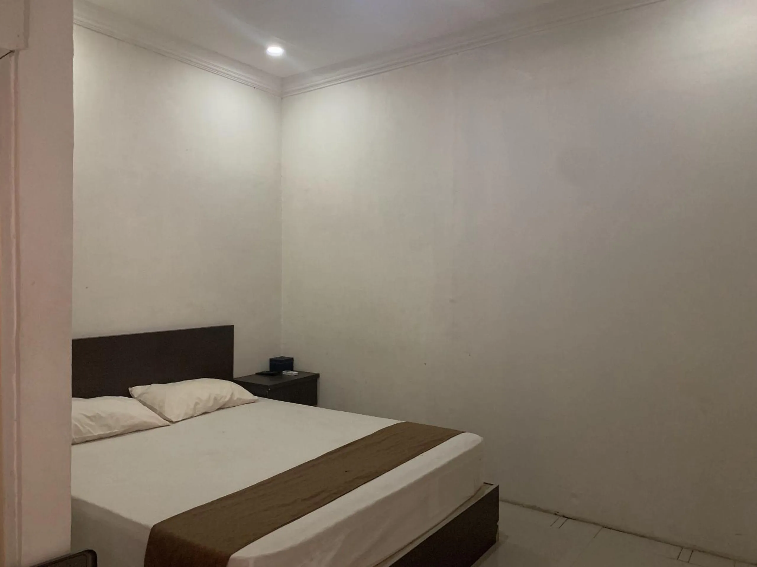 Bedroom, Bed in Hotel O Penginapan Laota Syariah Near Rumah Sakit Islam Faisal Makassar