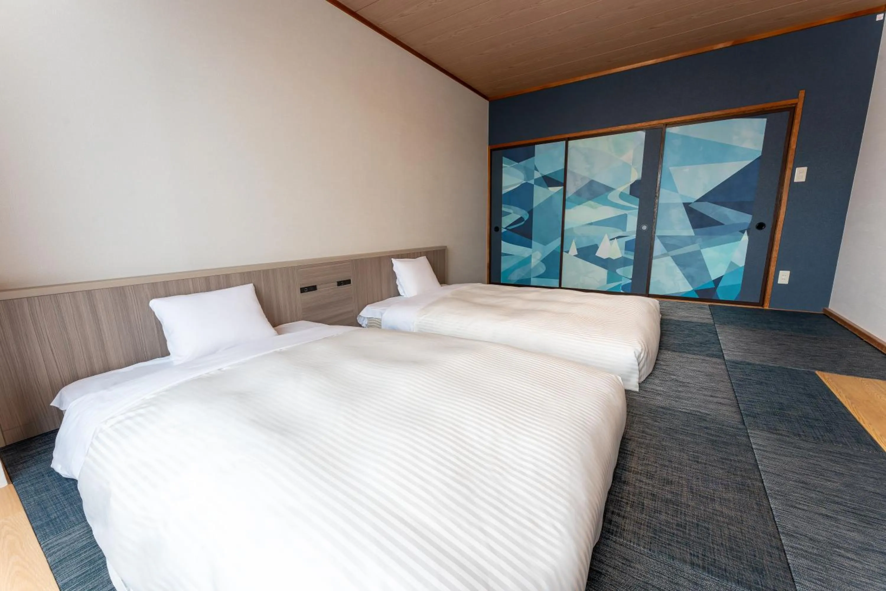Photo of the whole room, Bed in KAMENOI HOTEL Kusatsu Yubatake