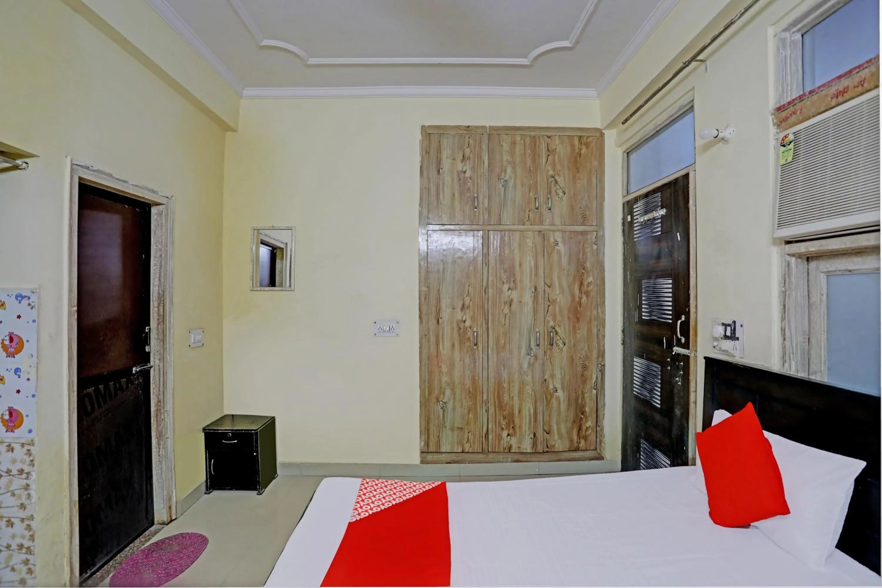 Bedroom, Bed in Hotel O Wamson Alpha Co living Stays