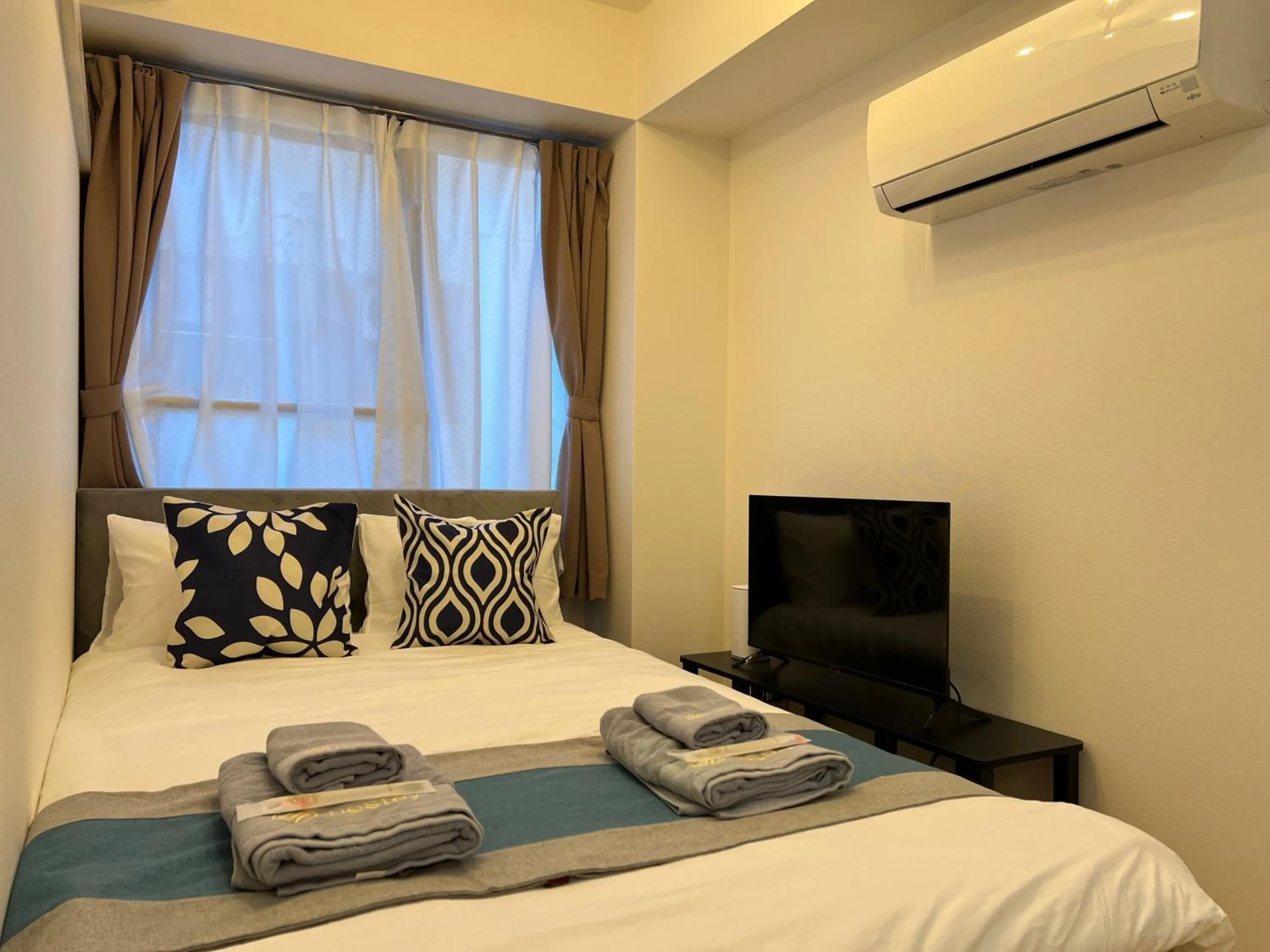 Bed in nestay apartment tokyo itabashi