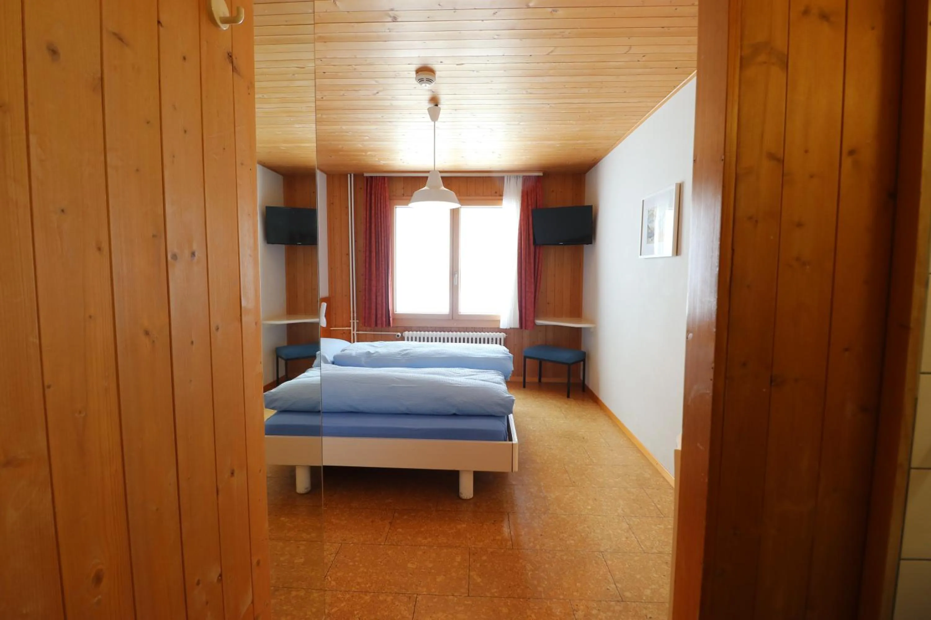 Bed in Berghotel Distelboden