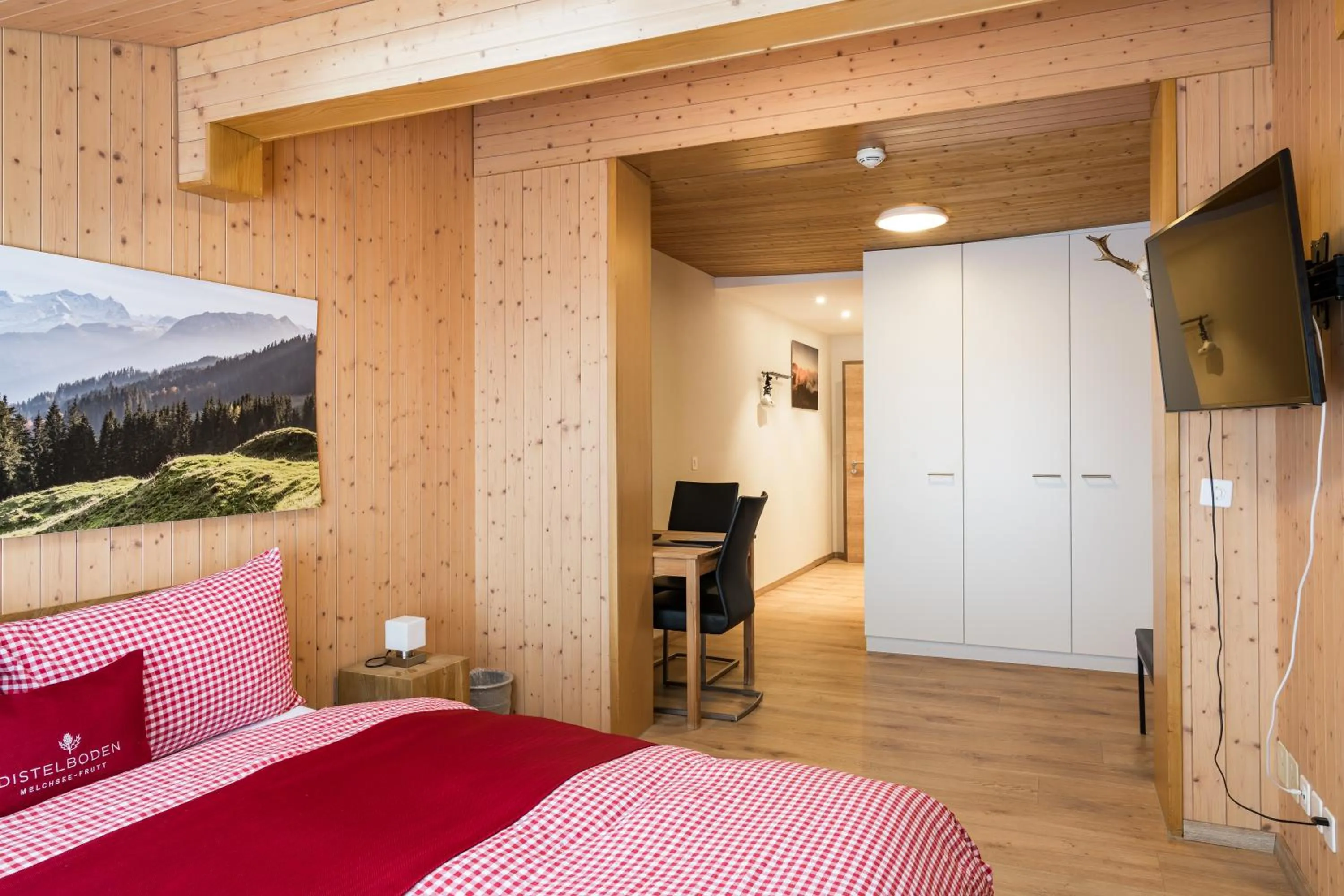 Photo of the whole room, Bed in Berghotel Distelboden